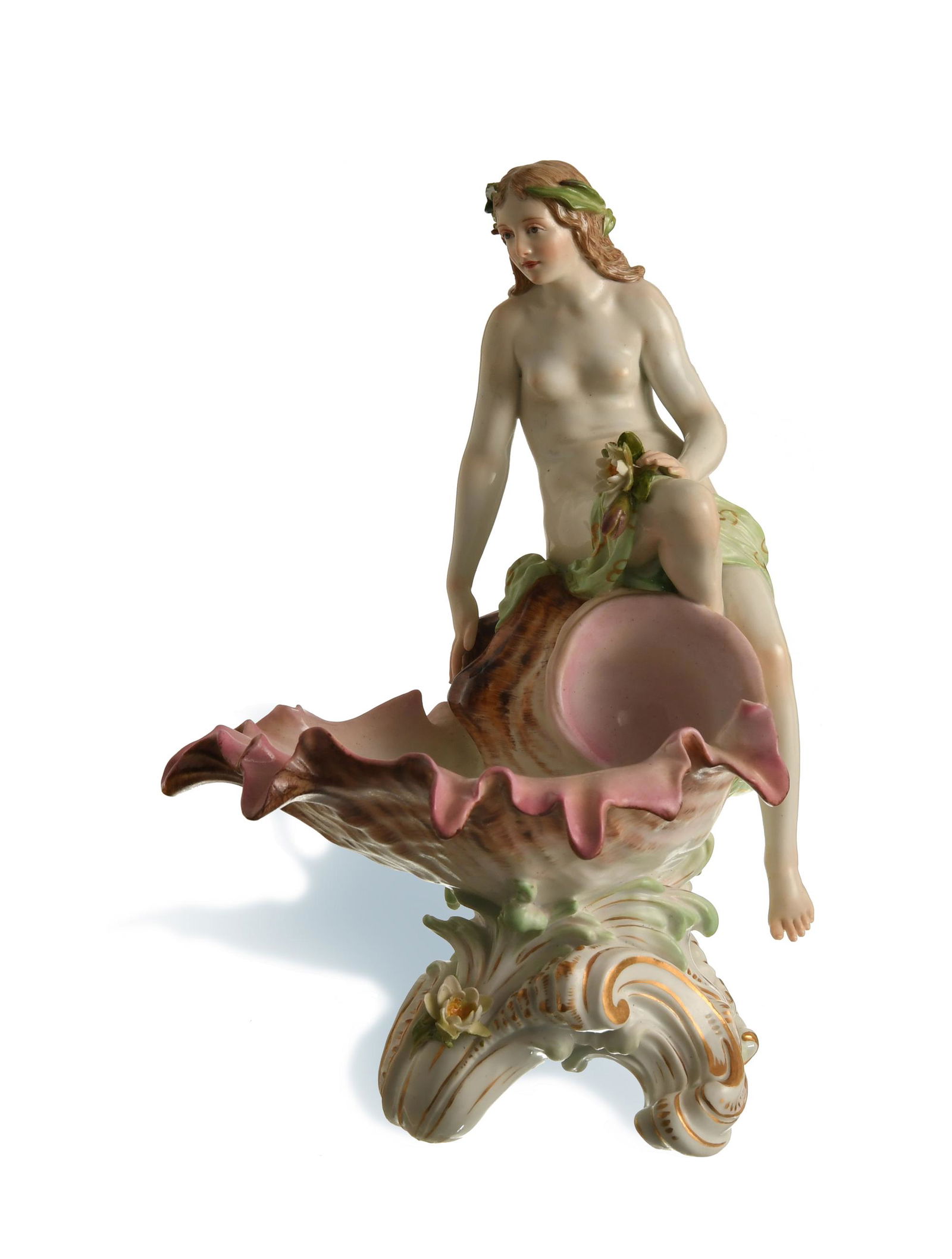 Meissen, Nymph on a Shell, Model P144: Meissen (German, founded 1710) porcelain. Designed by Konrad Henschel, featuring a nymph seated on a shell. It is stamped with the Meissen mark, model number, and P144 on the bottom. Dimensions: 10 1/
