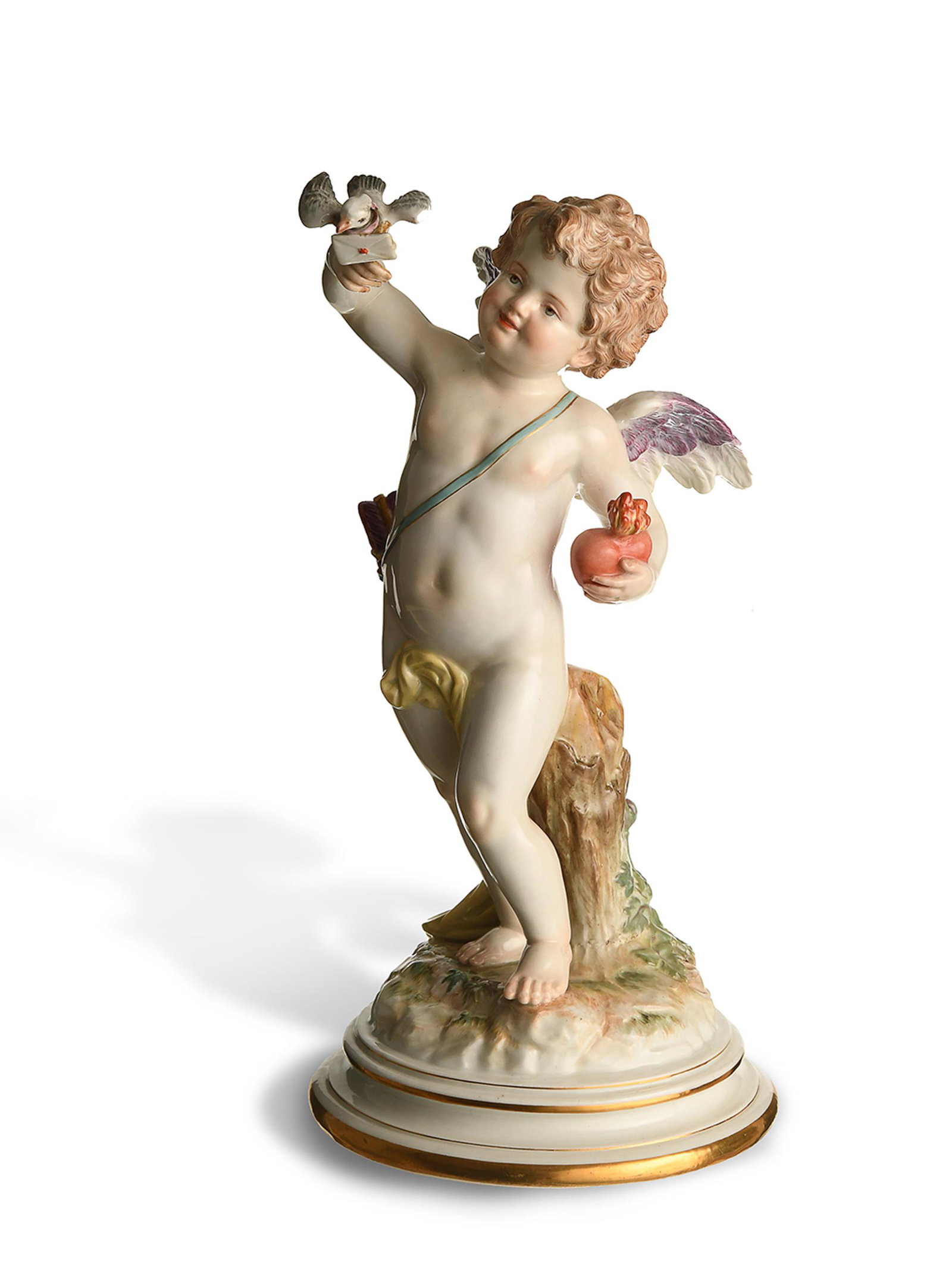 Meissen, Cupid Sending a Love Letter, Model M115: Meissen (German, founded 1710) porcelain. Designed by Johan Pollak, featuring a cupid sending a love letter. It is stamped with the Meissen mark, model number, '107,' and '54' on the base. Dimensions: