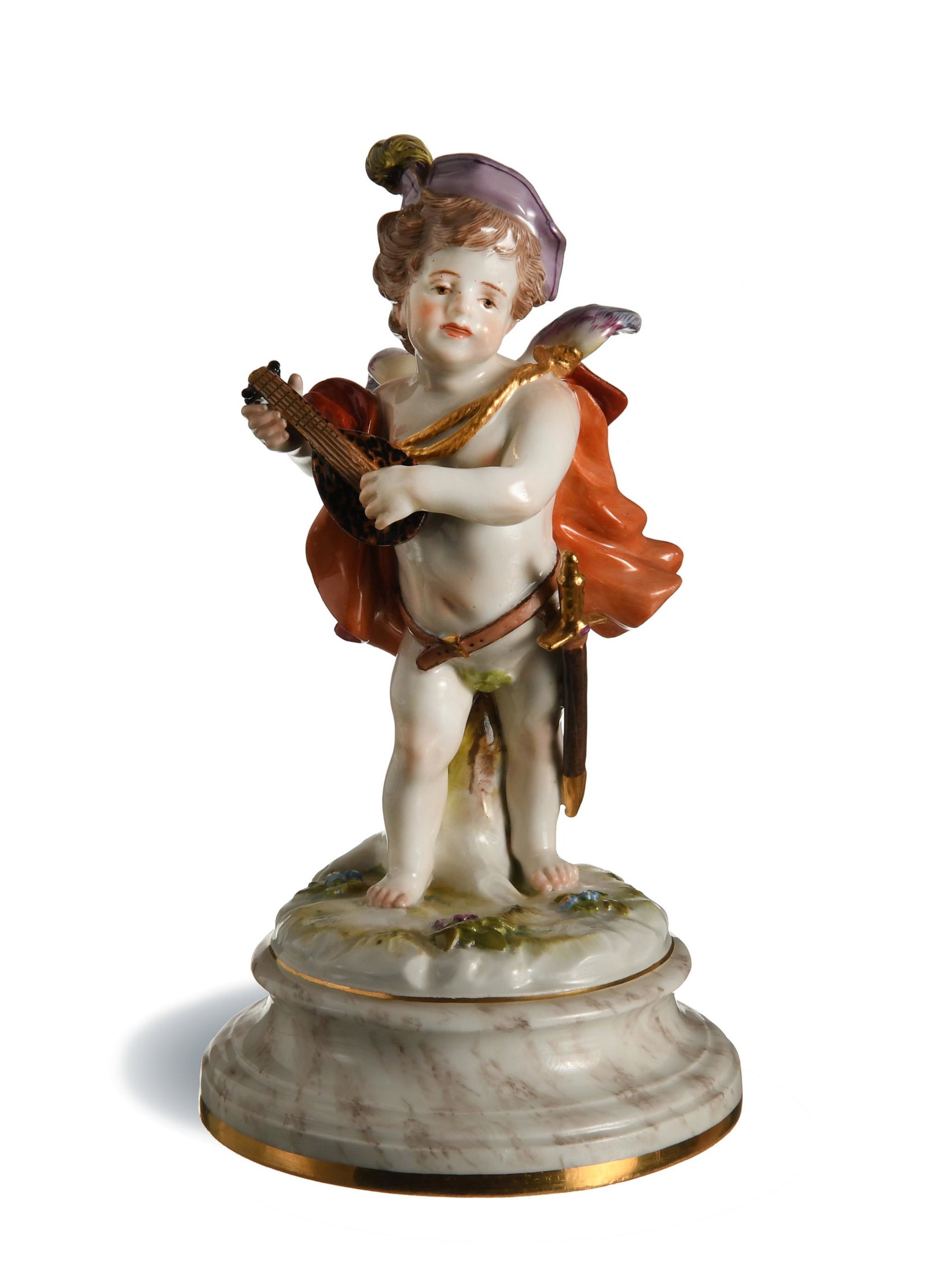 Meissen, Cupid Minstrel with a Lute, Model L124: Meissen (German, founded 1710) porcelain. Designed by Heinrich Schwabe, featuring a cupid playing a tortoiseshell lute and wearing a red cape. It is stamped with the Meissen mark, model number, 145,' 