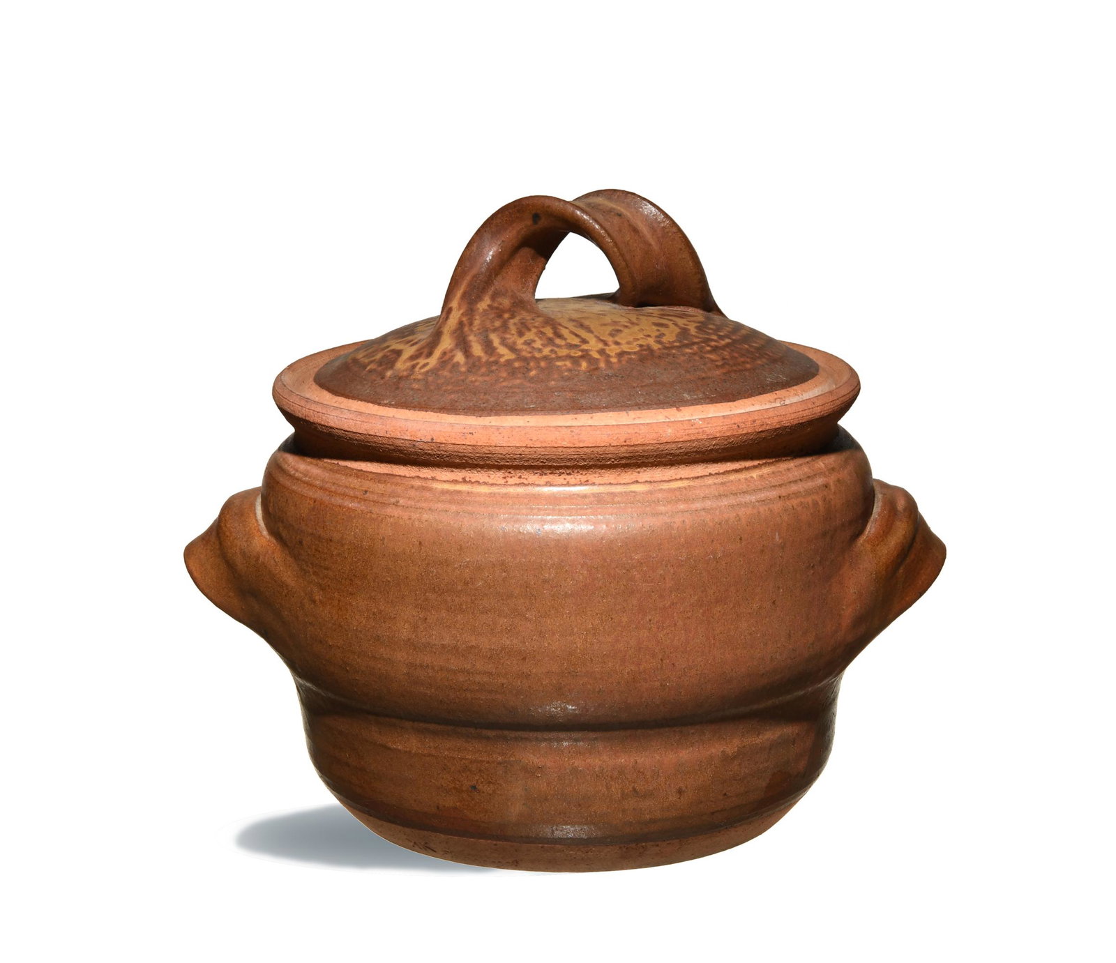 Karen Karnes, Covered Casserole Dish: Karen Karnes (American, B. 1925) clay. Clear glazed, covered casserole dish with handles on the sides. Initialed and stamped 'Flamenreef' [sic]on the rim of the base. Dimensions: 11 inches tall X 15 i
