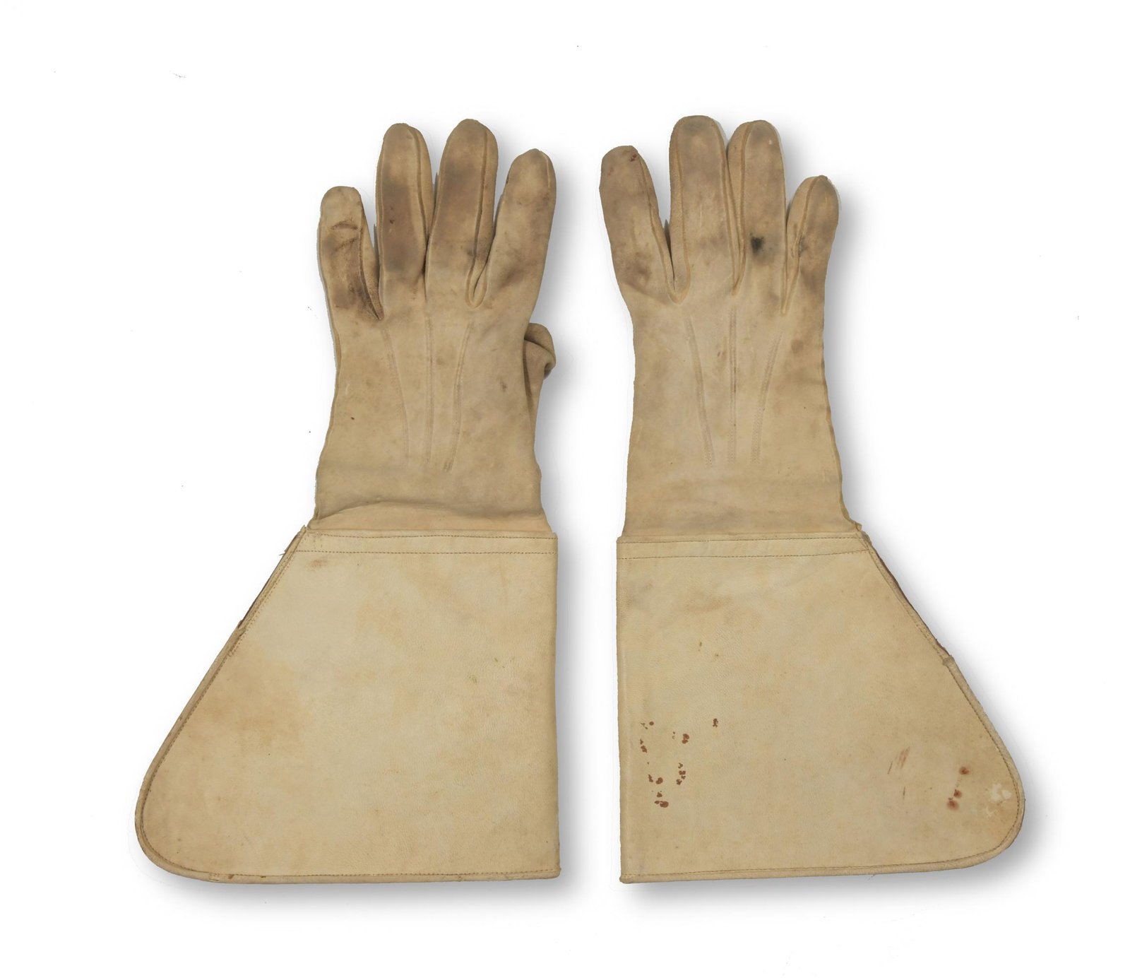 Cavalry Dress Gauntlets, Civil-Indian Wars: A pair of cavalry dress gauntlets dating to either the American Civil War or Indian War period. The interior of the gloves are marked 'Warranted Buckskin' and '8.' Dimensions: 14 inches long; 35.6 cm 