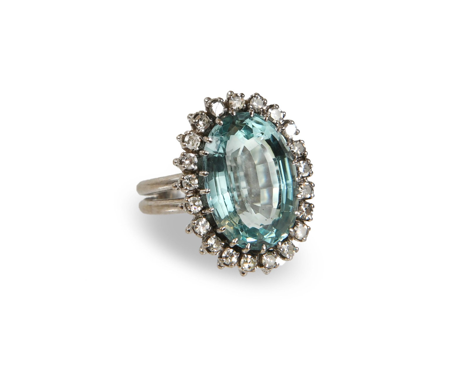 H. Stern, Vintage Diamond and Aquamarine Ring: H. Stern Jewelers (Brazilian, founded 1945) diamond and aquamarine. Large aquamarine of approximately 10.5 carats, surrounded by 21 small diamonds, each approximately .05 carats totaling just over 1ct