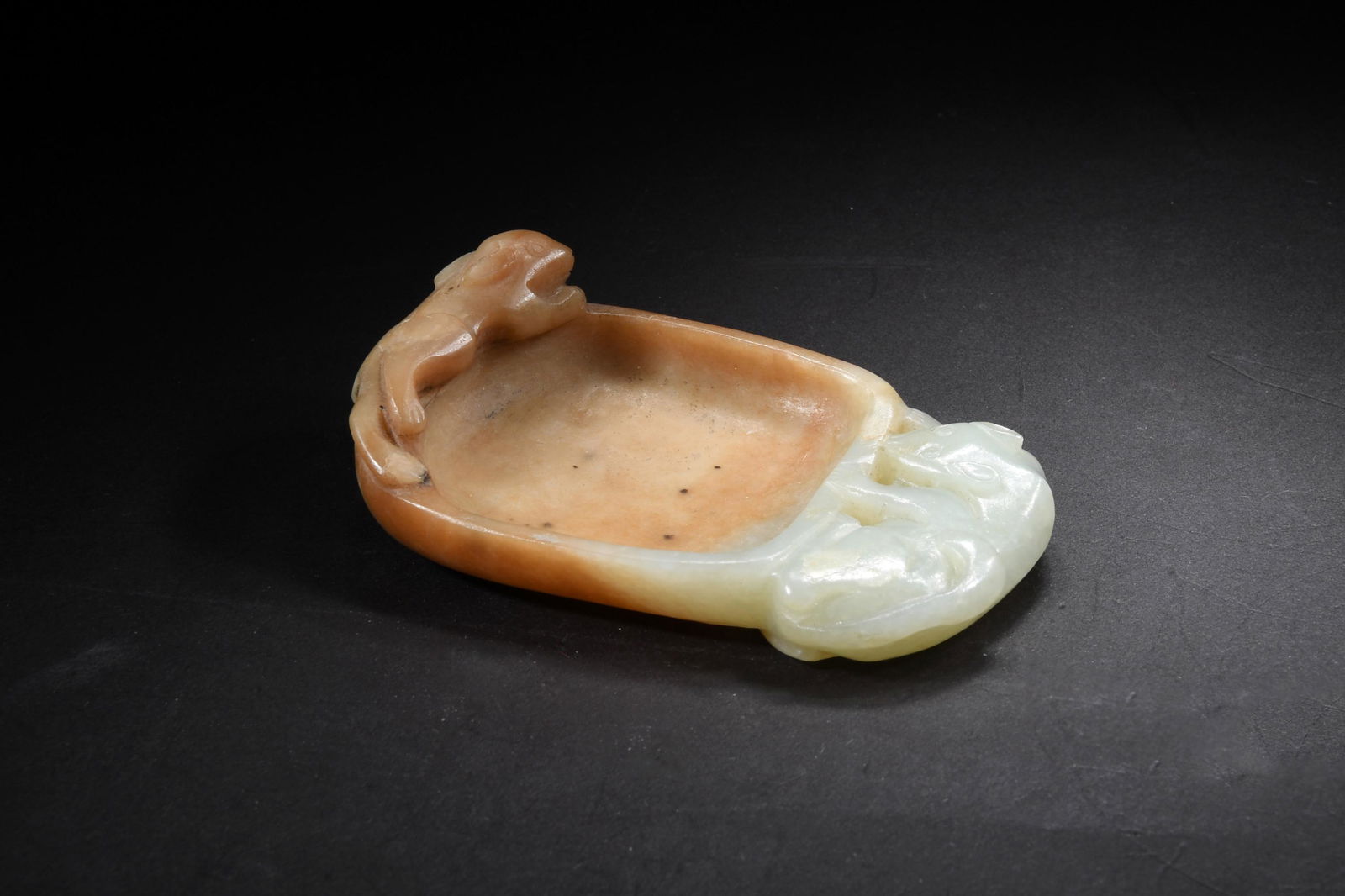 Chinese Jade Brush Washer with Squirrels, Ming: A Chinese jade with skin brush washer featuring 2 squirrels and dating from the Ming dynasty. Dimensions: 1 1/4 inches tall X 4 inches wide; 3.2 cm tall X 10.2 cm wide. All measurements are approximat