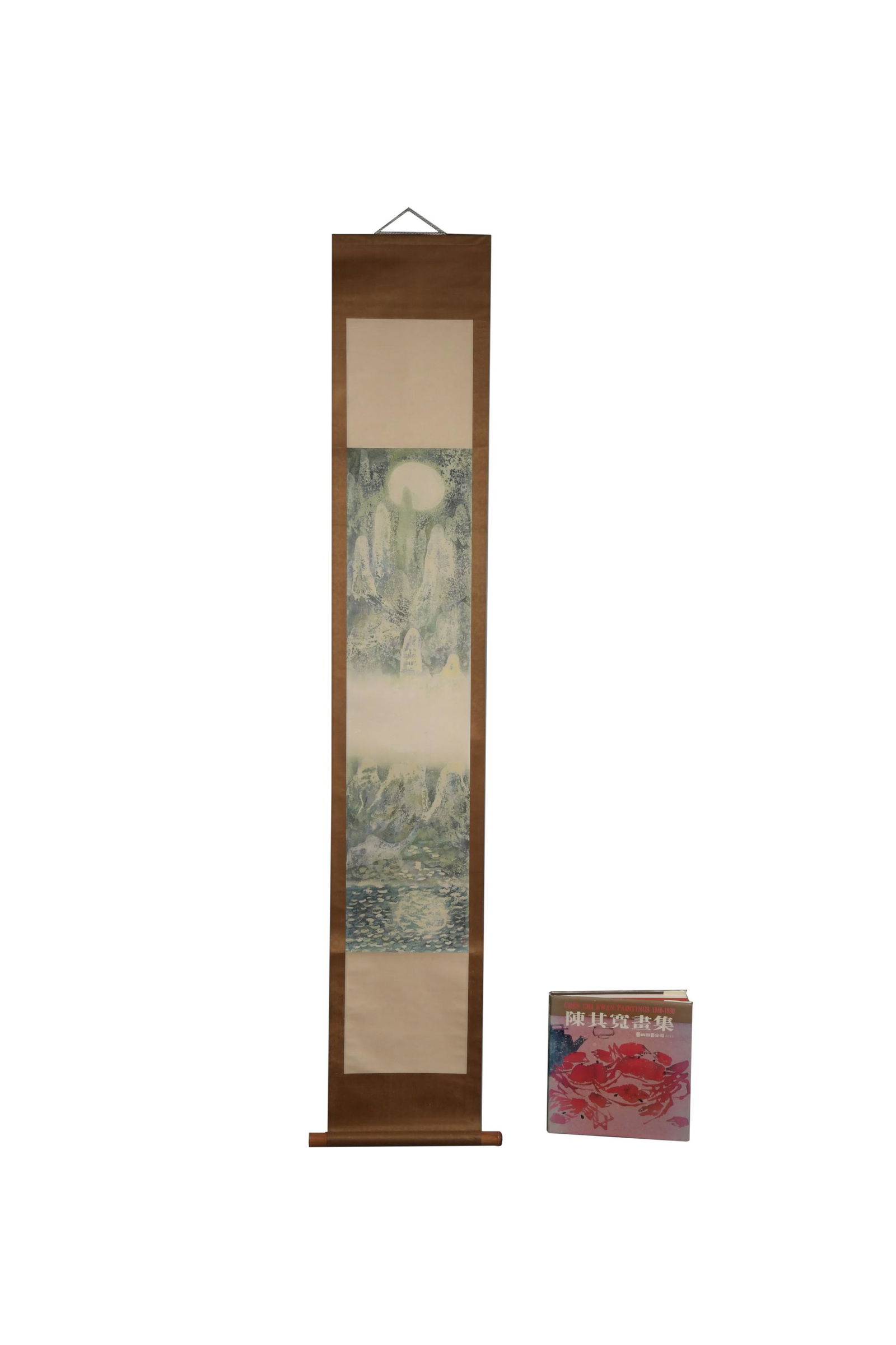 Chinese Painting of Moon & Book by Chen Chi-kwan: A Chinese watercolor and ink on paper painting by Chen Chi-Kwan and a book by the artist. The painting depicts a full moon in the mountains and includes an inscription and 1 seal. The painting is moun