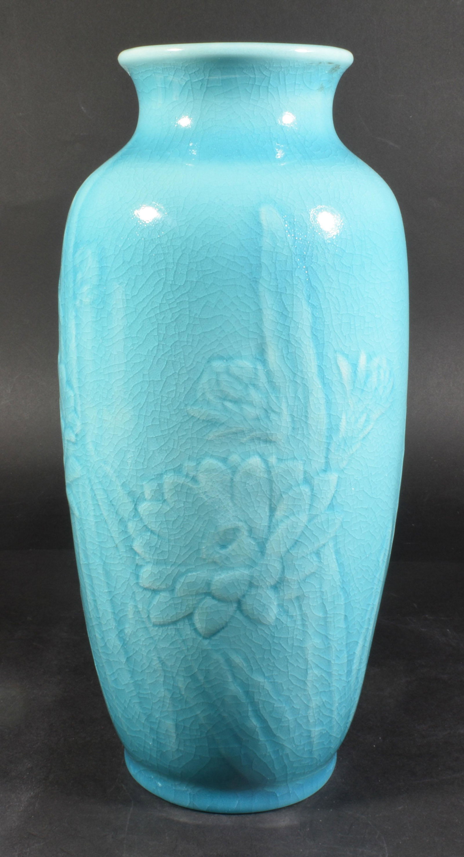 Rookwood Daffodil Vase Pattern 6870: Rookwood (American, founded 1880), pottery, 1947. Turquoise crackle finish vase with daffodil motif. Base of vase has date, makers mark and pattern number stamped before firing. Dimensions: 12 inches 