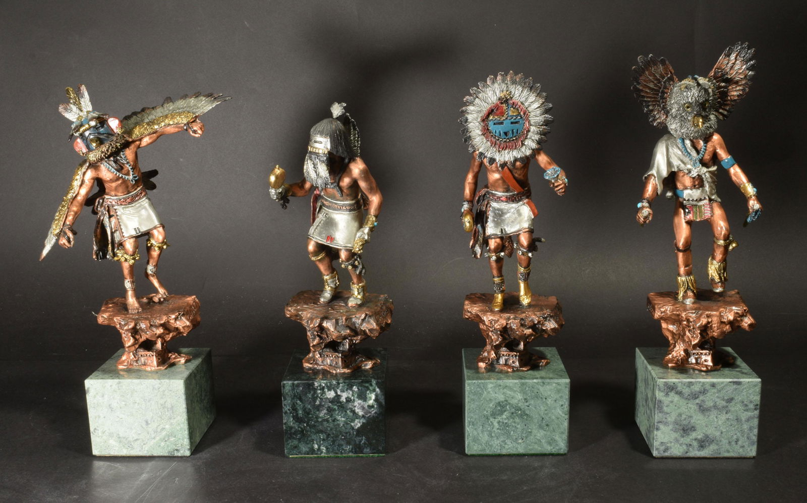4 C A Pardell, Legends Kachina Dancer Sculptures: C. A. Pardell (American, practicing 1987-), cast metal with enamel details and marble bases. 4 Legends Kachina Dancer sculptures.l Two in boxes, all with certificates. Titled "Kwahu", "Tawa", "Mongwa"