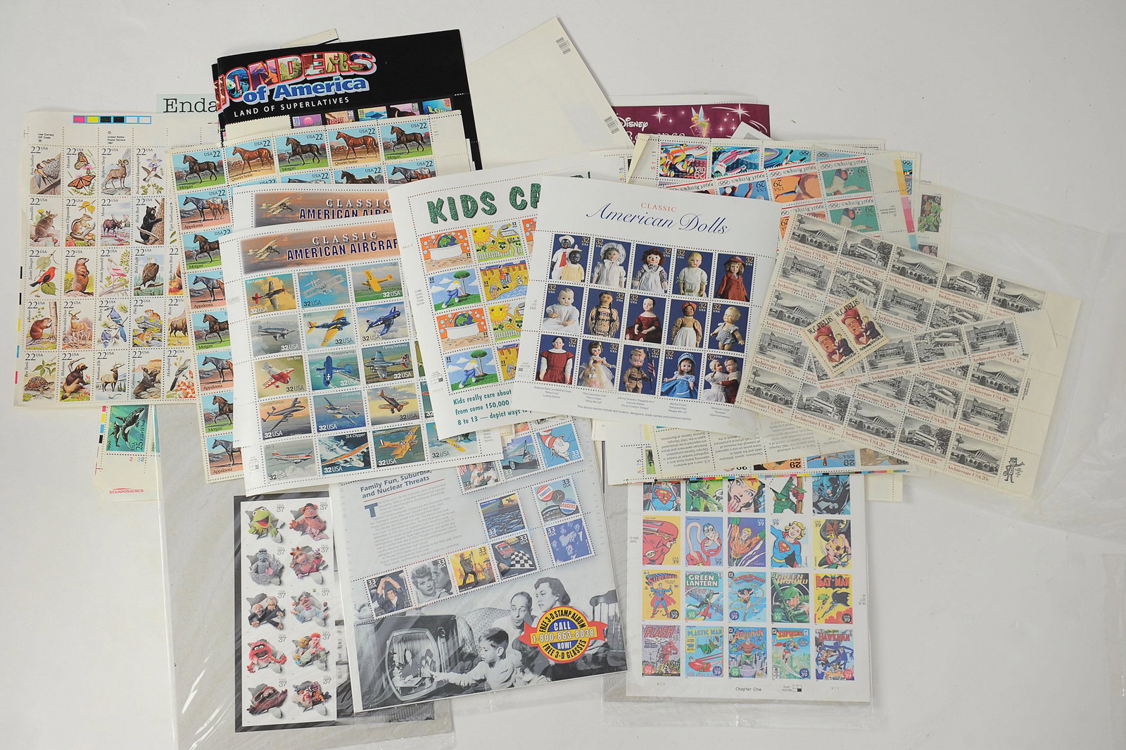 Large Group Unused US Postage Stamps $512.00 Face: All stamps are unused, plate blocks, singles, multiples. The figures on the card includes: the Muppets, Wizard of Oz, the Olympics, and others. Some are still in the original packaging. Face value $51