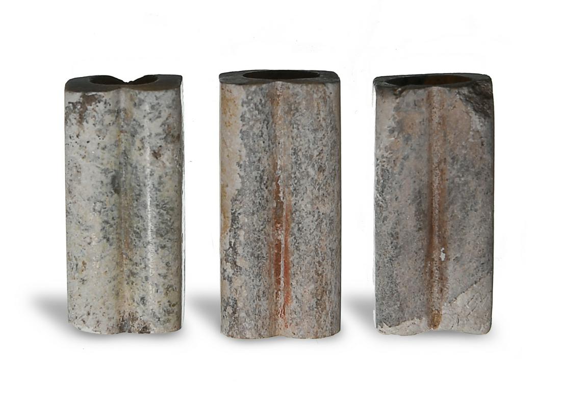Three Chinese Jade Tubes, Han: A group of 3 cylindrical Chinese tubes dating from the Han dynasty. Dimensions are: 7/8 inch tall X 3/8 inch wide, 2.2 cm tall X 0.9 cm wide. All measurements are approximate. Condition: Age-appropria