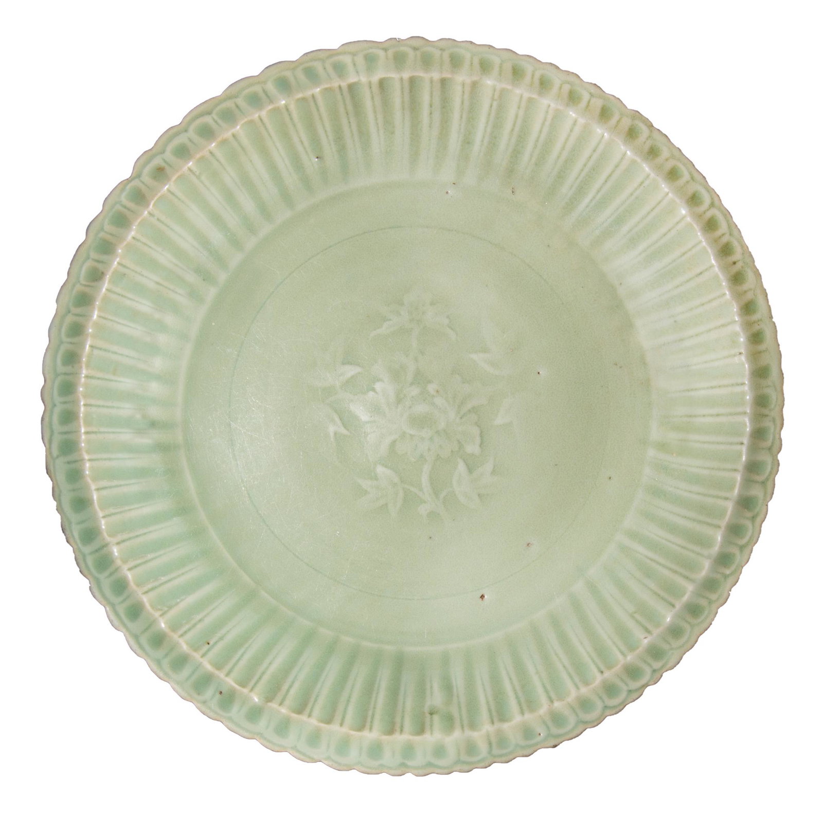Longquan Celadon Plate, Ming: A Chinese longquan celadon plate from the Ming dynasty. This pale green glazed plate is lobed and incised in the center with a floral medallion. Dimensions are 11 1/8 inches wide X 1 3/4 inches high, 