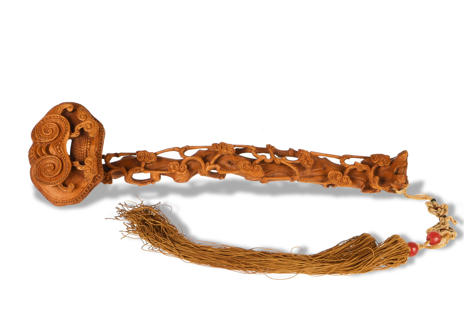 Chinese Lingzhi Ruyi Huangyang Scepter, 19th Century: A Chinese Huangyang wood ruyi scepter carved with lingzhi, dating to the 19th century. The scepter has long brown tassels with 2 pink tourmaline beads. Dimensions are: 12 in tall X 3 3/4 in wide, 30.5