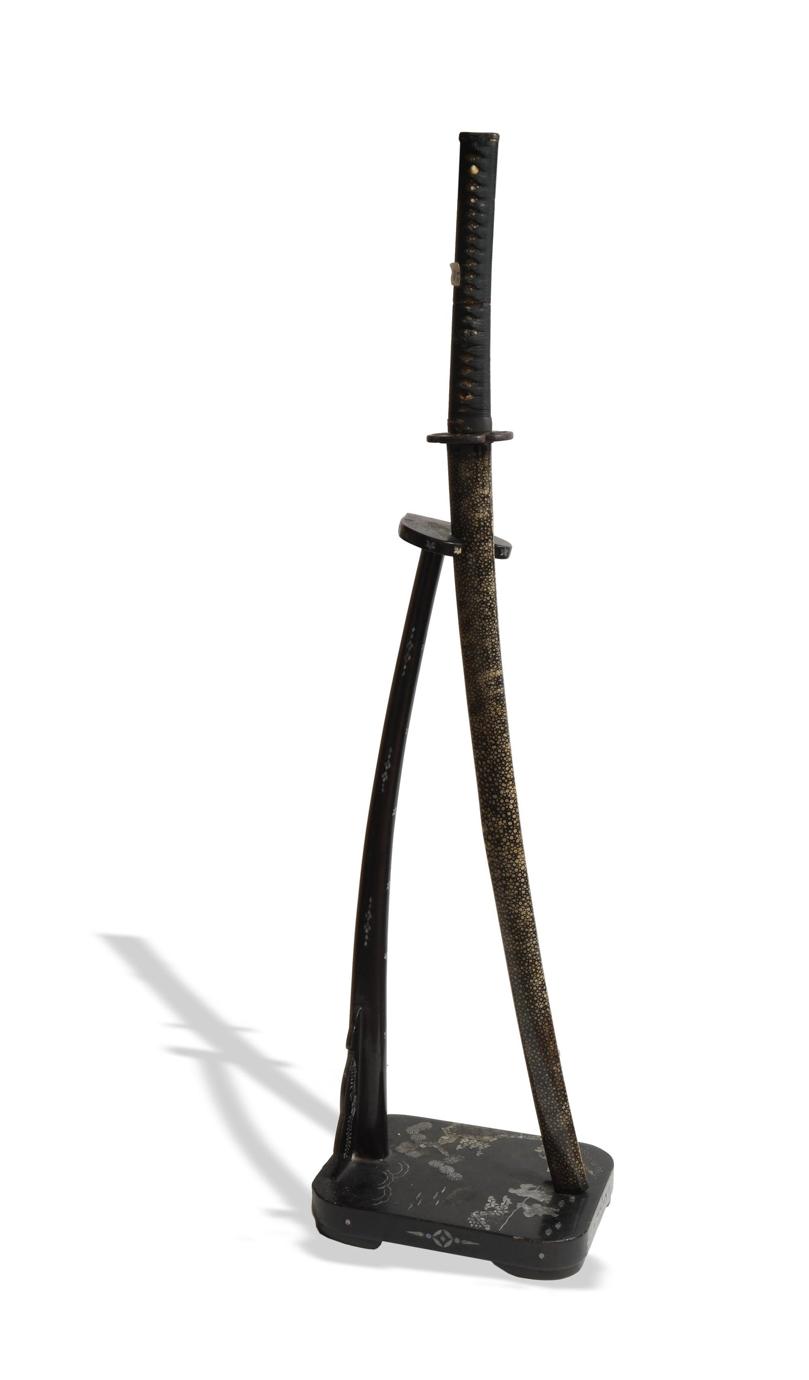 Japanese Katana, Signed, with Saya and Stand: A Japanese katana likely dating from the Edo period, in a lacquered saya. The tang has an unknown signature. comes with midare hamon, faint masame hada. Copper habaki, iron tsuba two bronze menuki, an