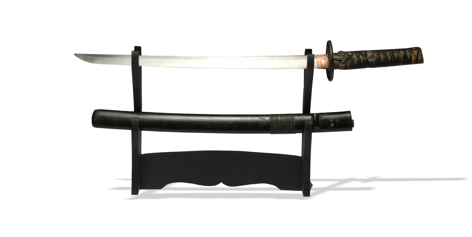 Japanese Wakizashi with Saya and Kogatana: A Japanese wakizashi likely dating from the Edo period and in wood saya. It has a midare hamon, itame hada. Copper habiki, iron 'chain link' tsuba, 2 bronze menuki, and a mixed metal kashira. It is si