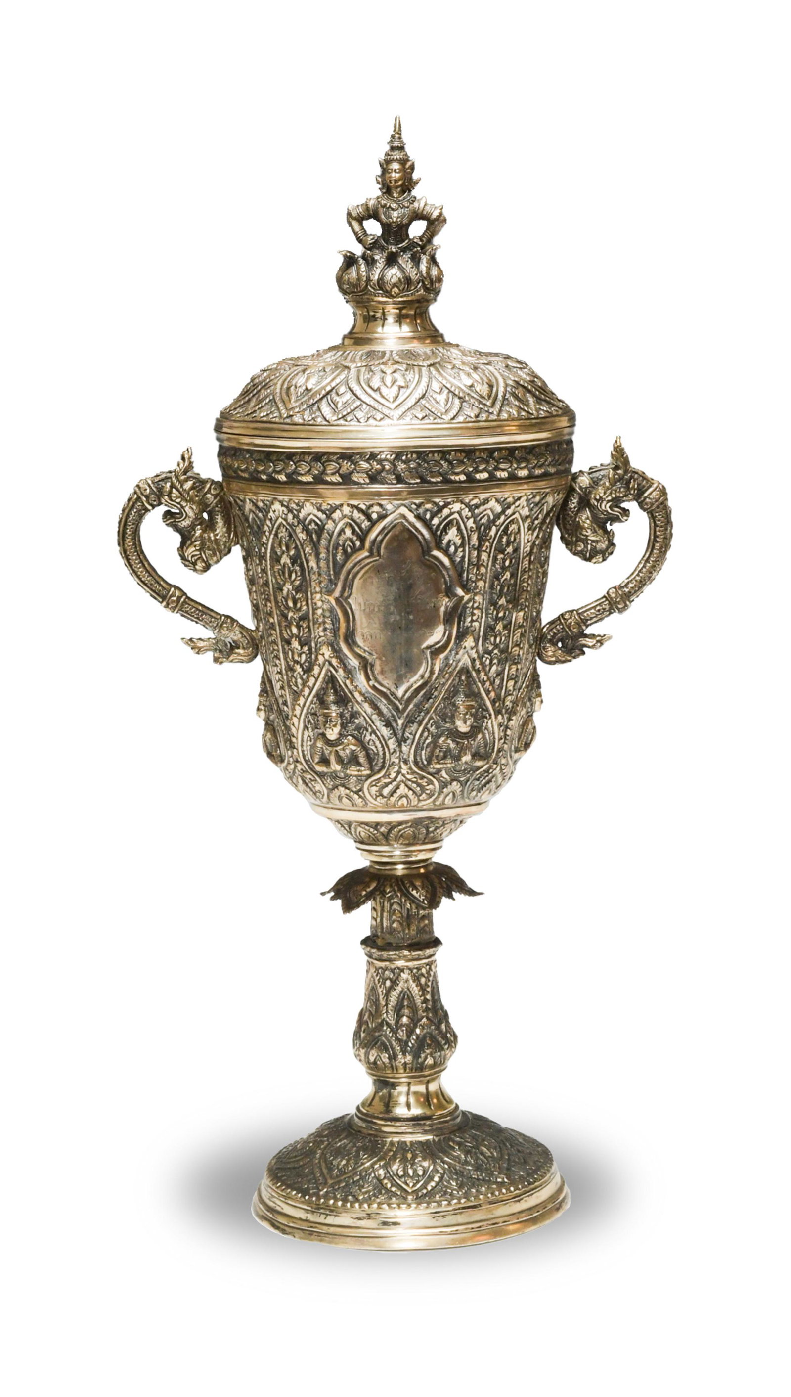 Thai or Burmese Silver Presentation Cup with Lid: A Thai or Burmese silver presentation cup with a lid. The cup features 6 figures in the Anjali mudra around the base of the cup surrounded by a floral motif. The cup has 2 beast handles and a central 
