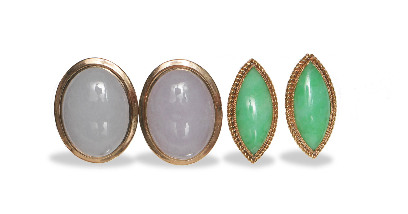 2 Pairs of Chinese Jadeite 14K Cufflinks, Republic: Two pairs of Chinese jadeite and 14K cufflinks dating from the Republic period. Dimensions: 7/8 inch tall X 3/4 inch wide, 2.2 cm tall X 1.9 cm wide. All measurements are approximate. Condition: Both 