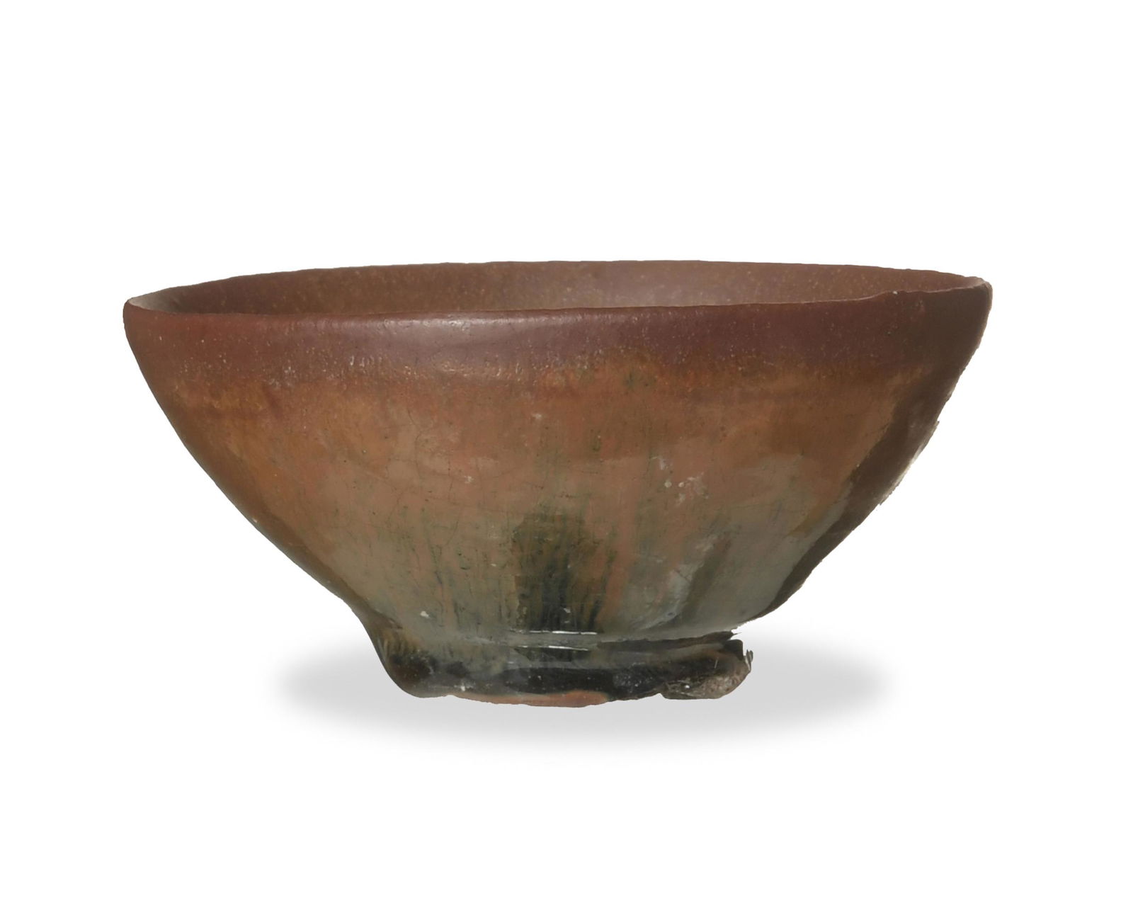 Chinese Jian Glazed Tea Cup, Song: A Chinese Jian glazed tea cup dating from the Song dynasty. Dimensions: 1 1/2 inches tall X 3 1/2 inches wide; 3.8 cm tall X 8.9 cm wide. All measurements are approximate. Condition: One very small ch