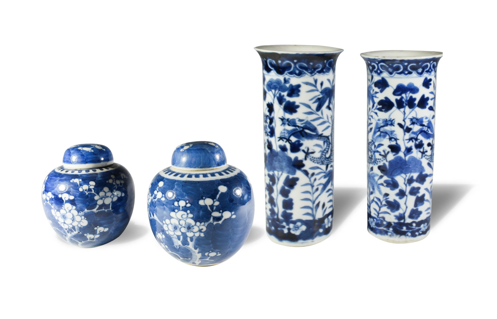 Group of 4 Chinese Blue and White Porcelains: A group of 4 Chinese blue and white porcelain items. Includes a pair of vases featuring a pair of dragons among flowers, both have a 4-character mark on the bottom. This lot also includes a pair of gi
