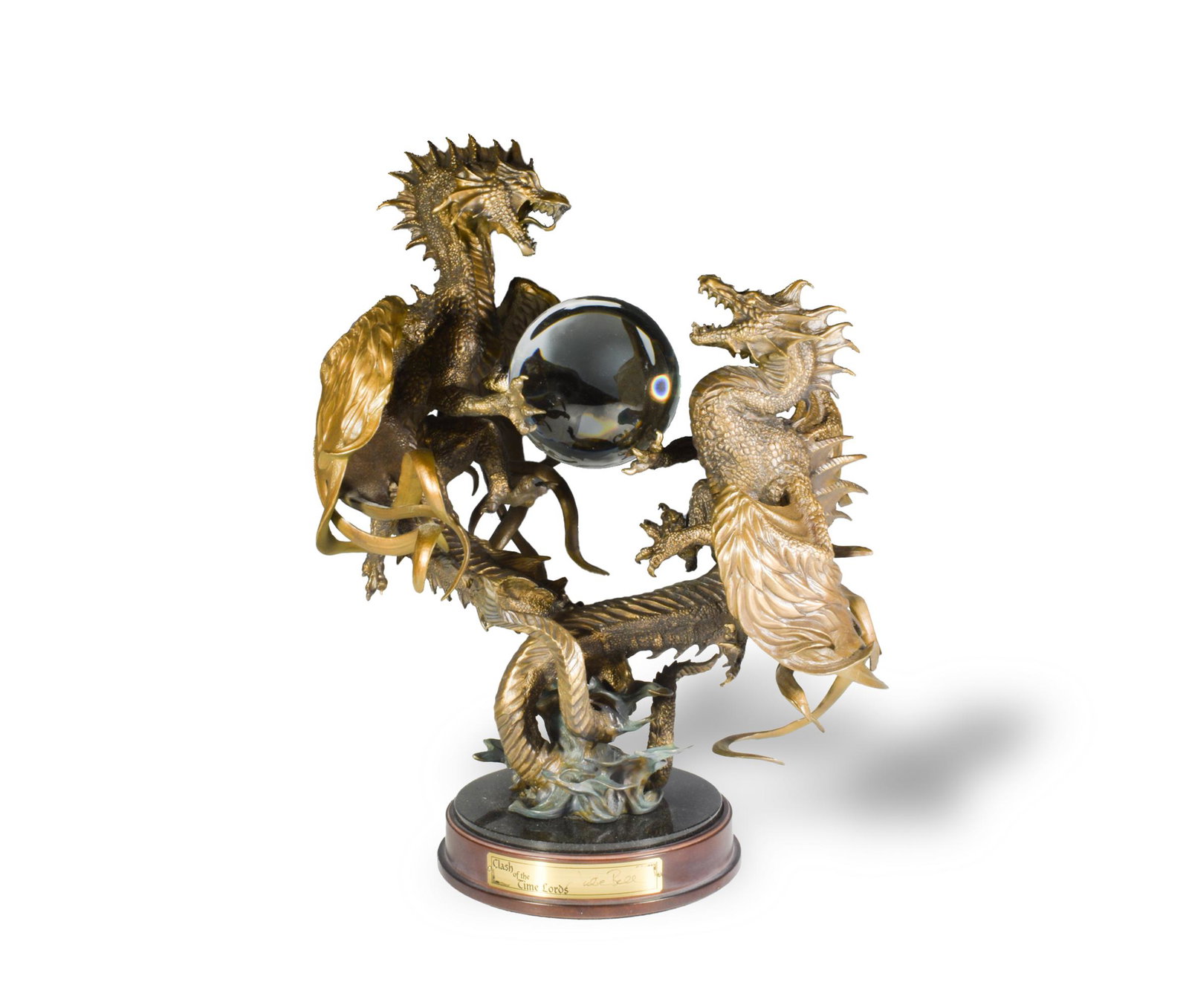 Bell, Boxed Franklin Mint Clash of the Time Lords: Julie Bell (American b. 1958) for Franklin Mint, mixed materials. The sculpture depicts two dragons entwined with a crystal ball between them. The sculpture is mounted on a wood and black marble plint