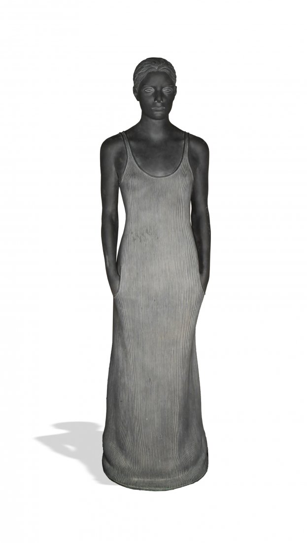 Diana K. Moore, Bronze Figurative Sculpture: Diana K. Moore (American, born 1946) bronze, 1999. A life-size sculpture of a woman in a striped dress. Dimensions: 72 inches tall X 19 inches wide; 182.9 cm tall X 48.3 cm wide. All measurements are 