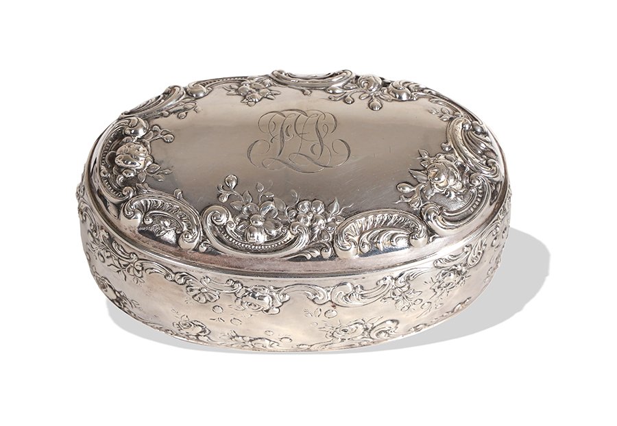 Gorham Sterling Silver Repousse Jewelry Box: Gorham Manufacturing Company (American, 1831) sterling silver, pattern B150. A jewelry box featuring repousse roses, scroll work, and a monogram, complete with fitted interior. It is marked on the bot