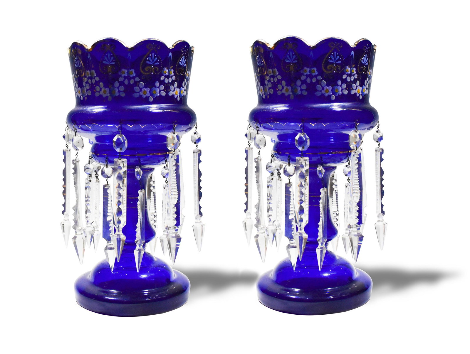 Pair Large Enameled Czech Cobalt Glass Lustres: Antique, hand-enameled, cobalt, Bohemian glass lustres with prisms. Dimensions are: 14 3/8 inches tall X 7 1/4 inches dia.; 36.5 cm tall X 18.4 cm dia. All measurements are approximate. Condition: Sca