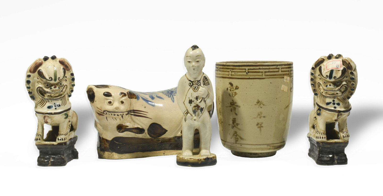 5 Chinese Cizhou Porcelains, Ming or Earlier: Five Chinese Cizhou ware ceramics dating from the Ming dynasty or earlier. Includes: a pillow in the shape of a cat and glazed with a tan ground and brown and blue details; a tan-ground pot with brown