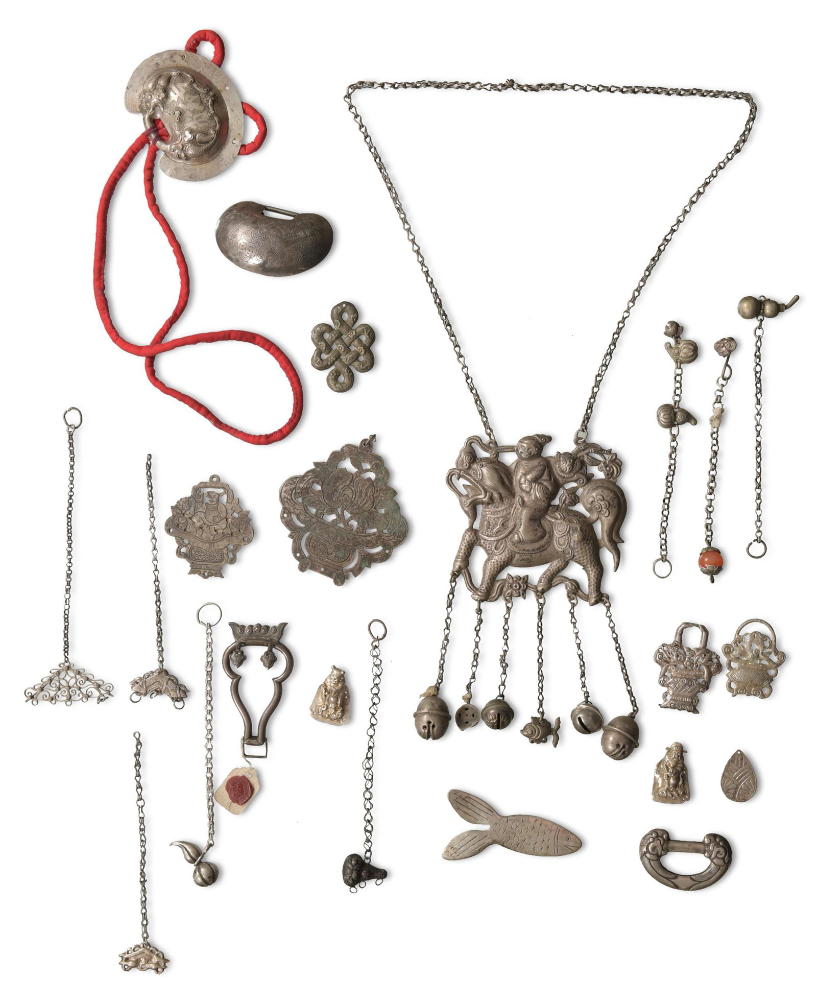 Group of Chinese Silver Jewelry, 19th Century: This group consists of four locks in different forms; eight watch fobs, some with gourds, coral, and lattice work; a watch stand with a wax stamp; a silver fish; silver adornment; and plaques. The lar