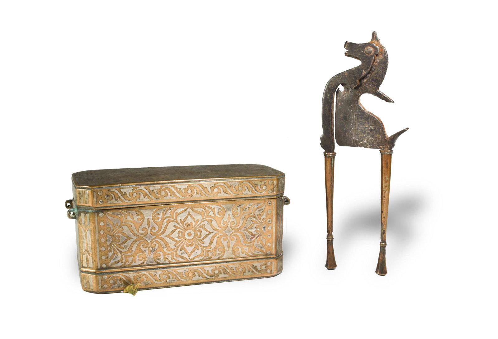 19th Century Silver Inlay Betel Nut Box & Cutter: A brass betel nut box with silver inlay, comes with purchase receipt from 1976. An iron and copper horse head betel nut cutter with silver inlay dating from the 19th century. Dimensions are: Box, 6 3/
