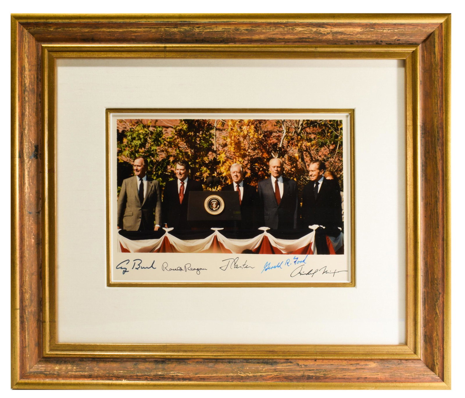 Color Photograph Signed by Five Presidents: Color photo signed by five US Presidents: George Bush, Ronald Reagan, Jimmy Carter, Gerald Ford, and Richard Nixon. Comes with copy of purchase receipt from Profiles in History and their label on vers