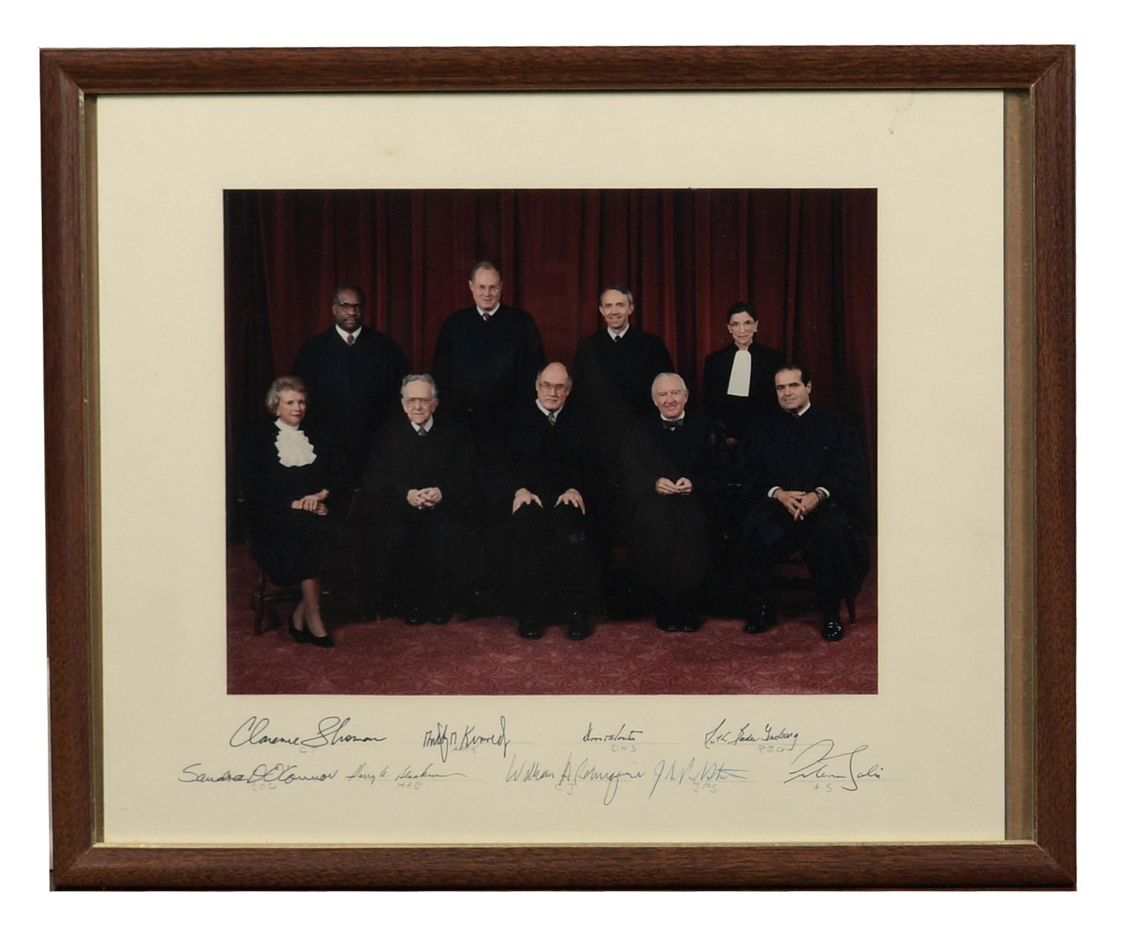 1994 Rehnquist Supreme Court Justices Signed Photo: Photo of the Rehnquist-headed Supreme Court circa 1994. Signed on the mat in person by each member of the court: William H. Rehnquist, David Souter, Ruth Bader Ginsburg, Clarence Thomas, Harry A. Blac