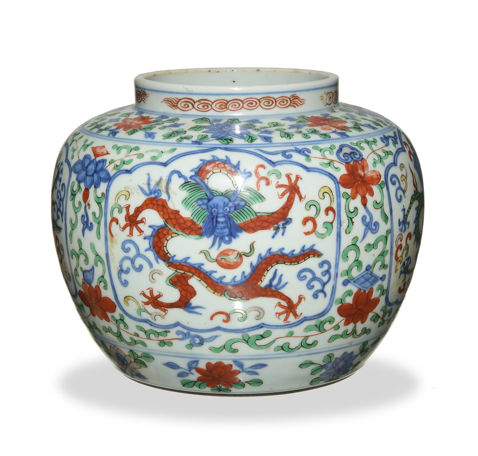 Chinese Wucai Jar with Jiajing mark, 19th Century: A Chinese wucai jar with a 6-character Jiajing mark and dating from the 19th century. The jar features 4 stylized ruyi frames containing 5-clawed dragons amongst lotus tracery. Dimensions are: 6 1/2 i