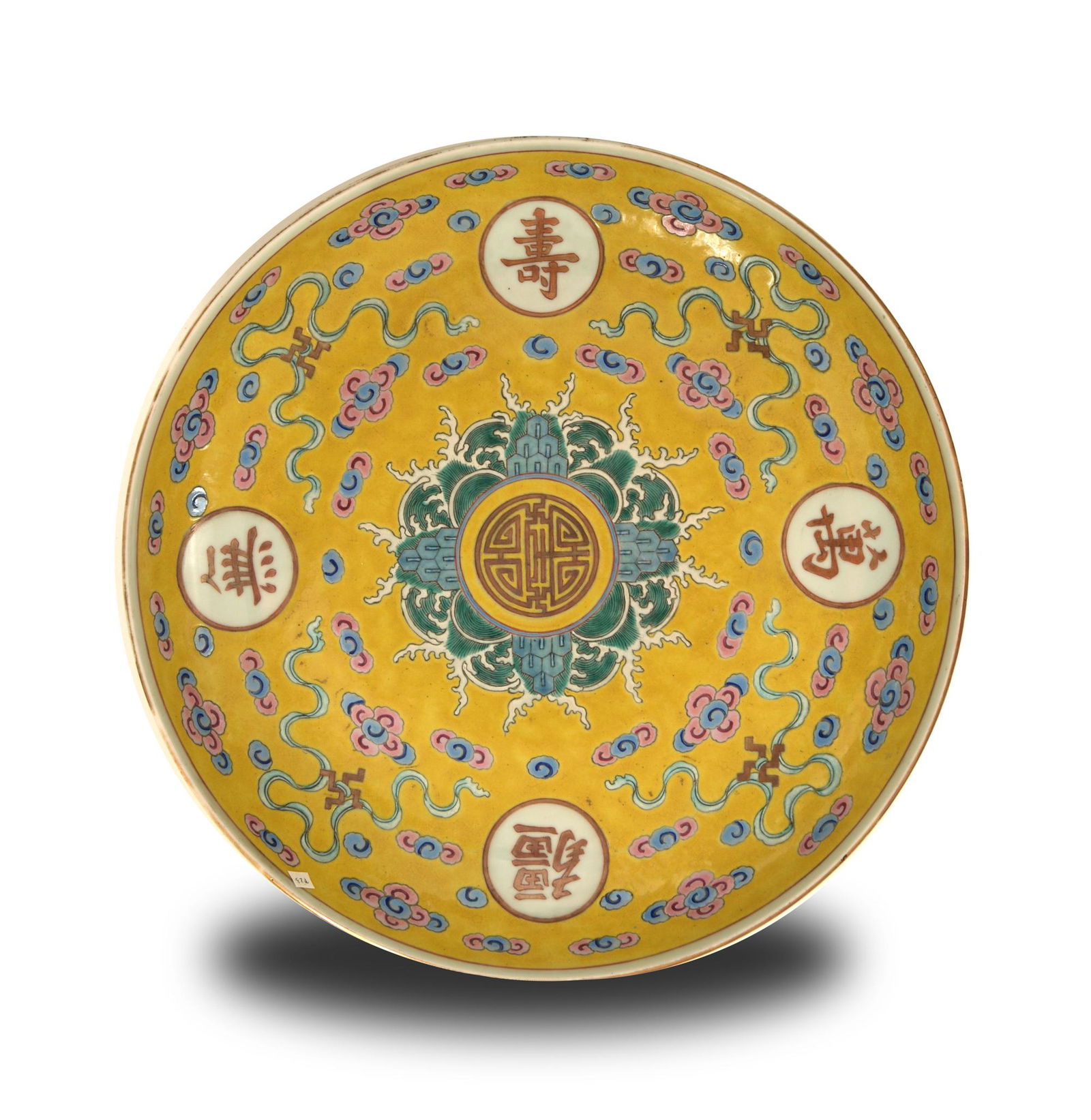 Imperial Chinese Famille Rose Charger, Guangxu: An Imperial Chinese famille rose longevity charger with a 6-character Guangxu mark and of the period. The interior features a Shou medallion, the wave and rock motif, and Buddhist crosses in a ruyi-cl