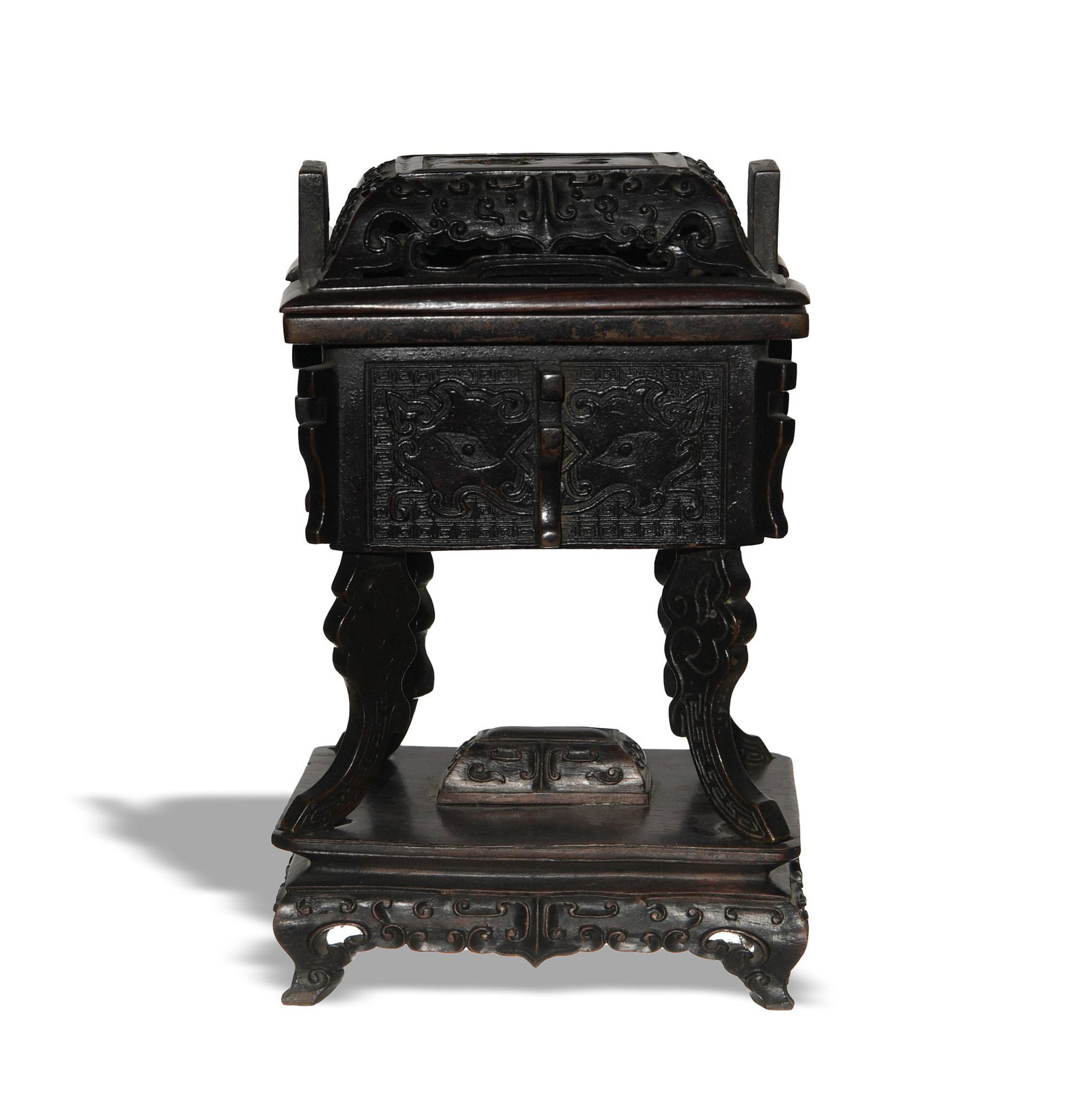Chinese Bronze Square Ding, 18th Century or Earlier: A Chinese bronze ding censer dating from the 18th century or earlier. The ding has an old hardwood cover and stand. The Ding features taotie masks. Dimensions are: 7 3/4 inches tall X 6 inches wide, 1