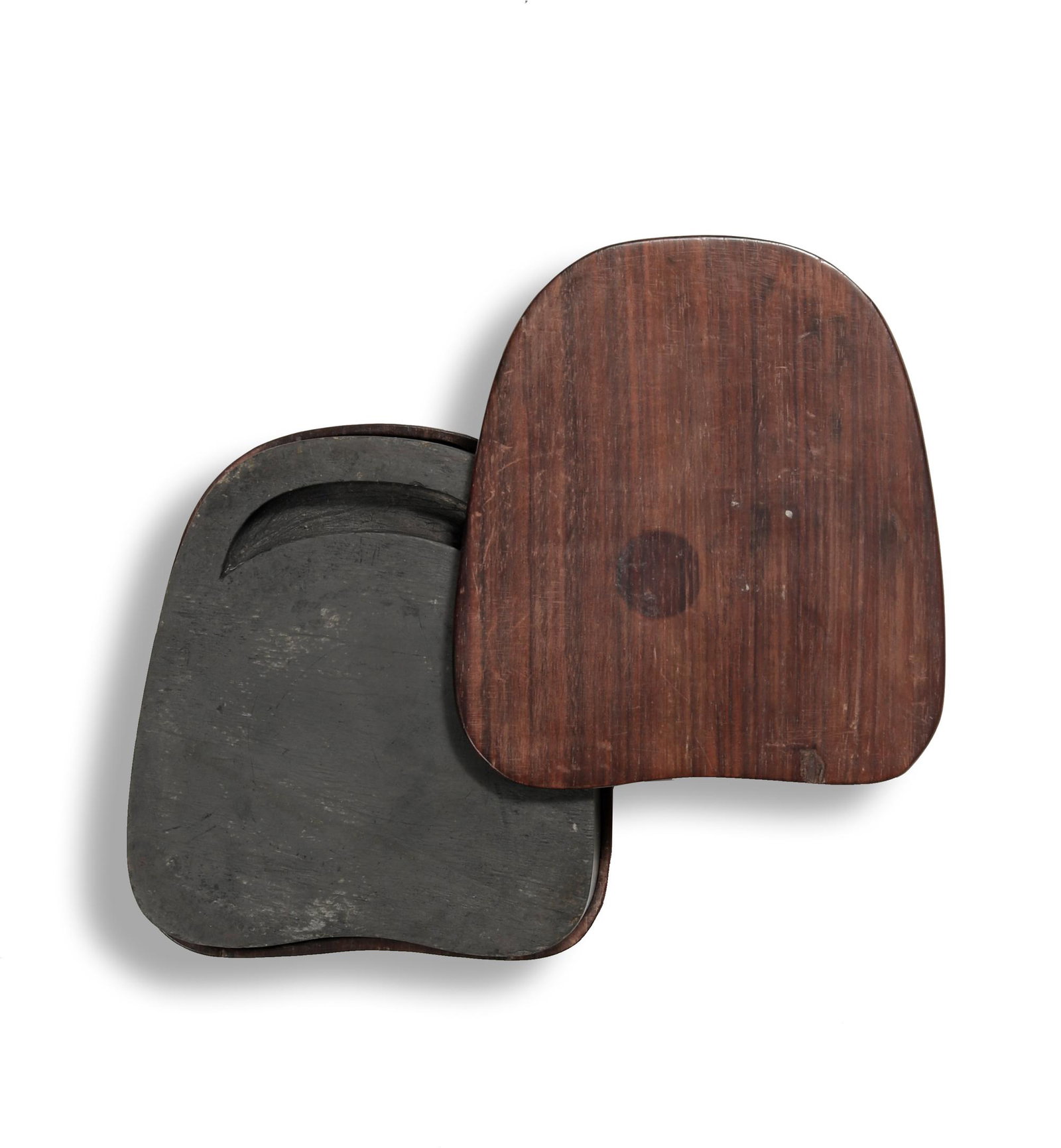Chinese Imperial 'Feng' Inkstone, Qianlong: A Imperial Chinese "feng" shaped inkstone dating from the Qianlong period with wooden covers. The reverse features an inscription and three seals, and there is an additional 7-character inscription on