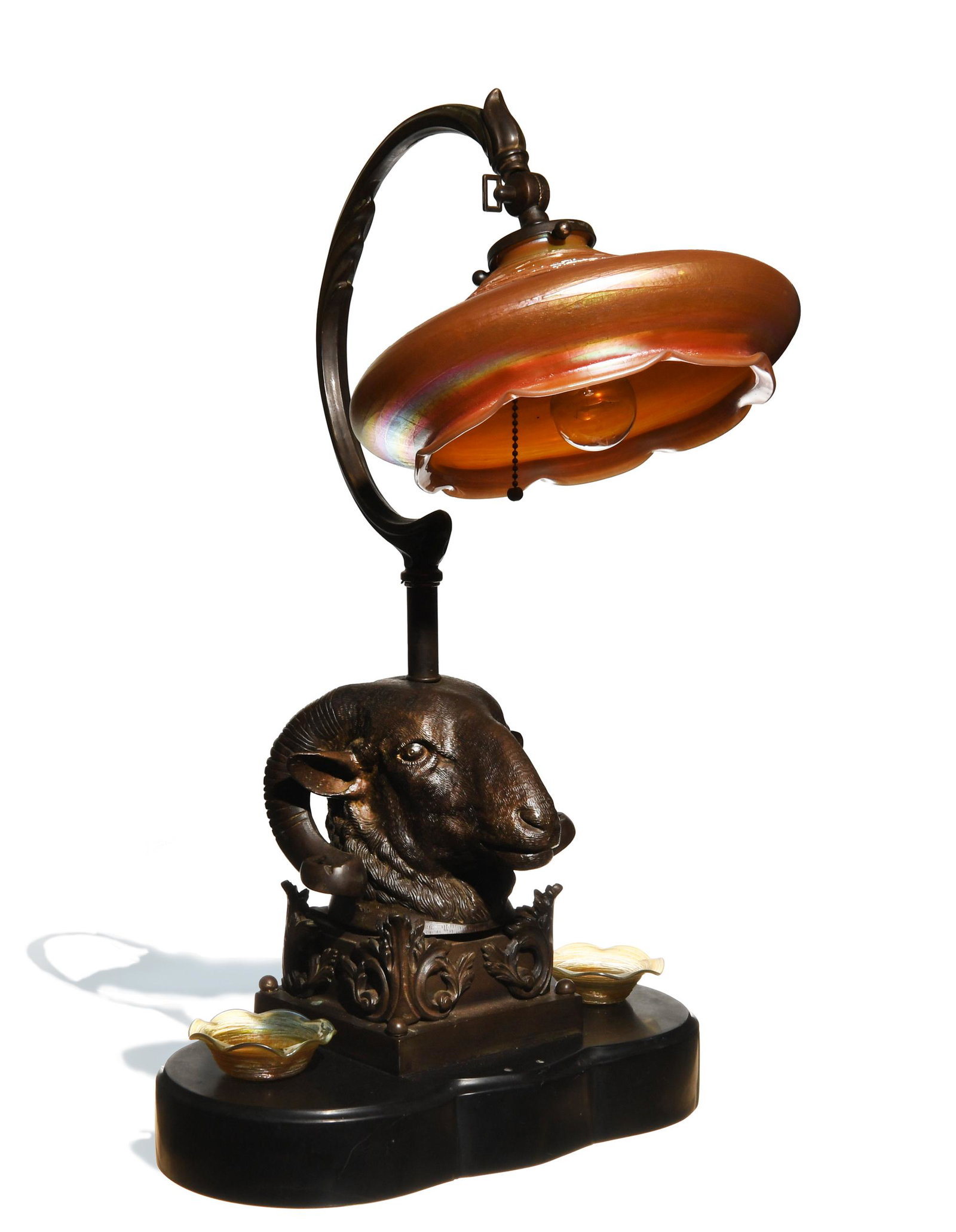 Bronze Ram Lamp with Loetz Glass Shade: Austrian bronze and Loetz Glass (German, founded 1836) bronze and glass. A bronze ram head mounted as a lamp with a Loetz Glass shade and candle inserts. Shade is numbered 1468. The statue is stamped 
