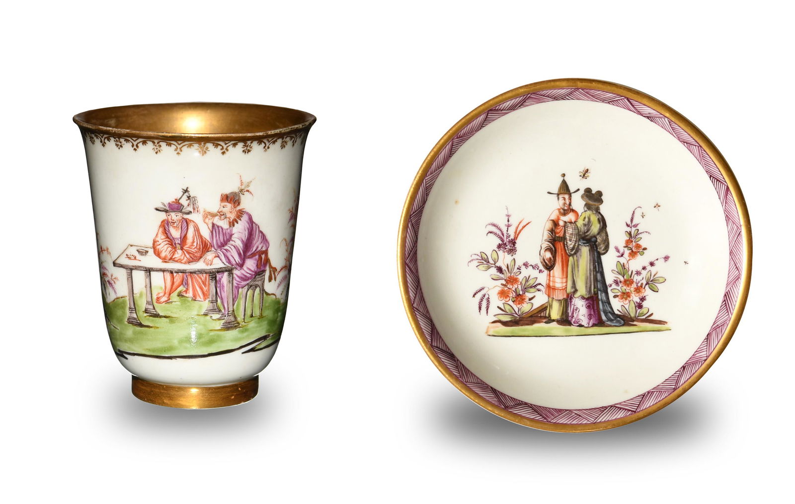 Meissen Chinoiserie Tea Cup and Saucer, 18th Century: Attributed to Meissen. Theme of the saucer is a man and woman in conversation bordered by a geometric pattern and a gilt rim. The Meissen logo of two crossed swords is on the bottom. Cup has theme of