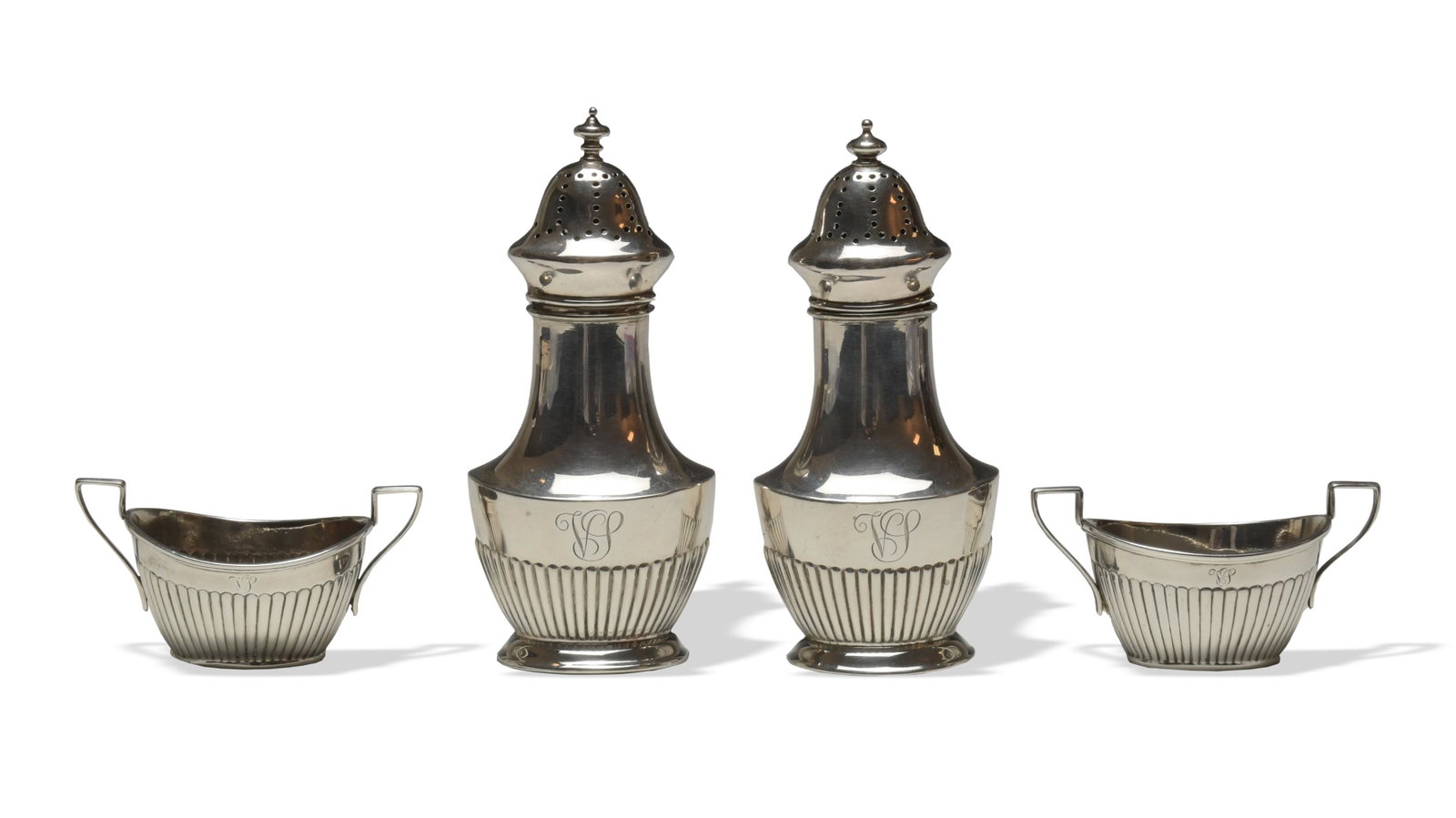 Pair Gorham Open Salts and Pepper Shakers, 19th Century: Gorham Manufacturing Company (American, founded 1831) sterling silver, pattern A5005. All pieces feature a ribbed bottom and have the hallmark for Spaulding and Co. of Chicago, one of America's premie