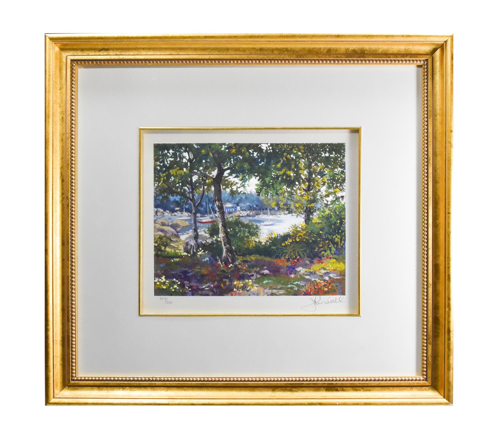 John Powell Serigraph 'Enchanted Coast' 304/350: Serigraph on Coventry paper signed and numbered 304/350 with certificate on verso. Subject is of boats in a coastal alcove painted through the trees on the bank. Dimensions: Sight area: 9 1/2 inches t