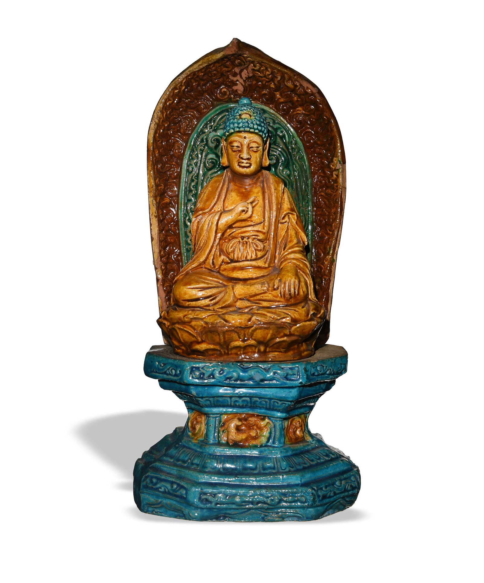 Chinese Sancai Buddha Statue, Ming Wanli: The twelfth year of Wanli period, Ming dynasty. Buddha glazed in tan with a blue hair and is sitting on a pedestal making a teaching gesture. Back plate is glazed in brown and green and contains calli