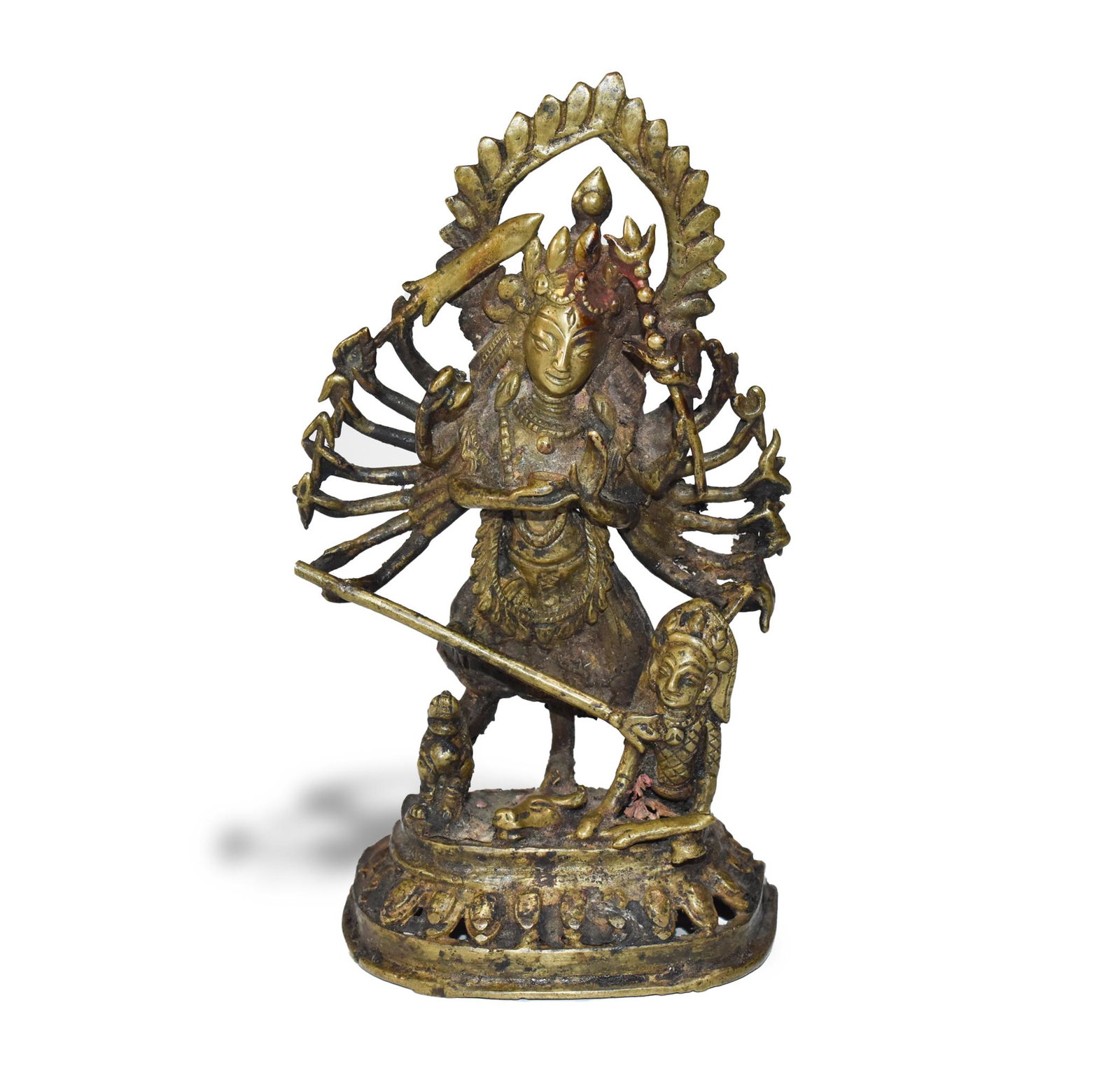 Bronze Buddha, 18/19th Century: Bronze figure of Buddhist deity from the 18 or 19th centuries standing on a guardian lion and a second humanoid figure with a sword. The deity has one head, three eyes, and eighteen arms, each hand ho
