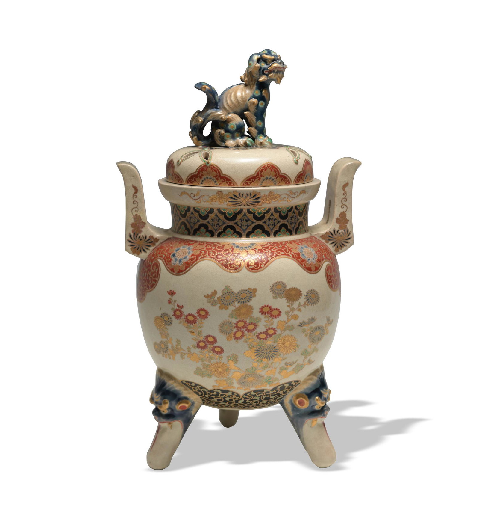 Japanese Gosu Blue Satsuma Tripod Censer: Late Edo or early Meiji. Lid of censer has a sitting guardian lion with the legs also being guardian lion heads. Exterior of the censer has gilt glaze with flowers in blue, gold, and iron red. Dimensi