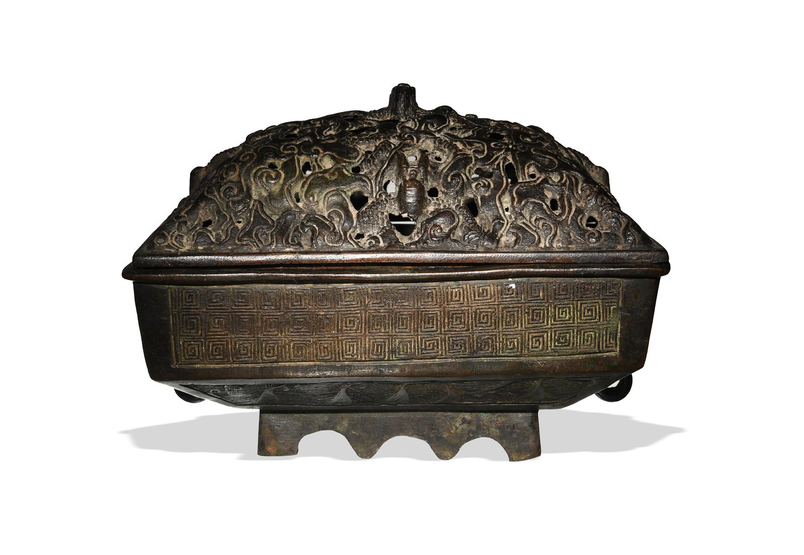 Chinese Rectangular Bronze Censer, Ming Dynasty: A Chinese rectangular bronze incense burner dating from the Ming dynasty with a lid. The incense burner body features a Greek key pattern while the lid depicts dragons among cloud tracery. Dimensions 