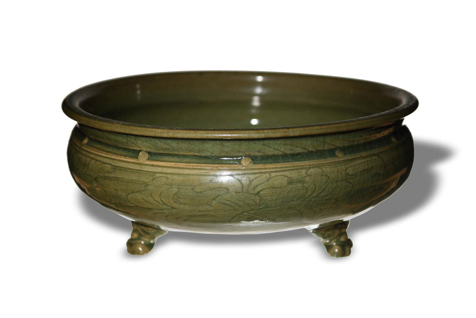 Chinese Celadon Longquan Tripod Censer, Yuan or Ming: A Chinese celadon tripod censer dating from the Yuan or Ming dynasty. The exterior has incised lotus decoration. Dimensions are: 5 1/4 inches tall X 12 inches wide, 13.3 cm X 30.5 cm. All measurements
