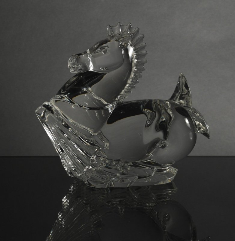 Steuben Crystal Seahorse Hippocampus by Pollard: Model No. 8340, designed by Donald Pollard,1976. Steuben etched on base of figurine. Dimensions are: 6 1/2 inches tall X 7 inches wide; 16.51 cm tall X 17.78 cm wide. All measurements are approximate.