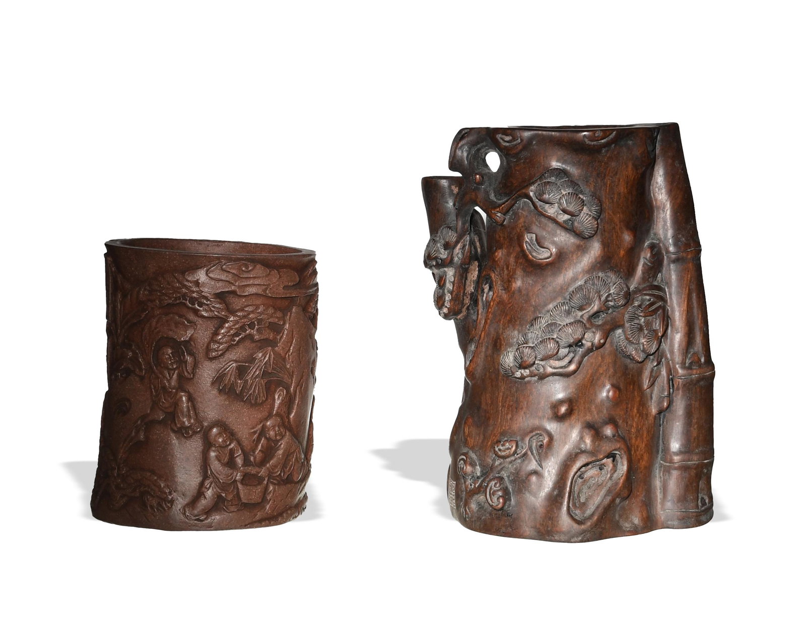 2 Chinese Zisha and Hardwood Brush Pots, Modern: Two Chinese brush pots, one made of hardwood and the other Zisha ware, both dating to the modern period. The Zisha brush pot is roughly cylindrical and is carved with six children playing with an elep