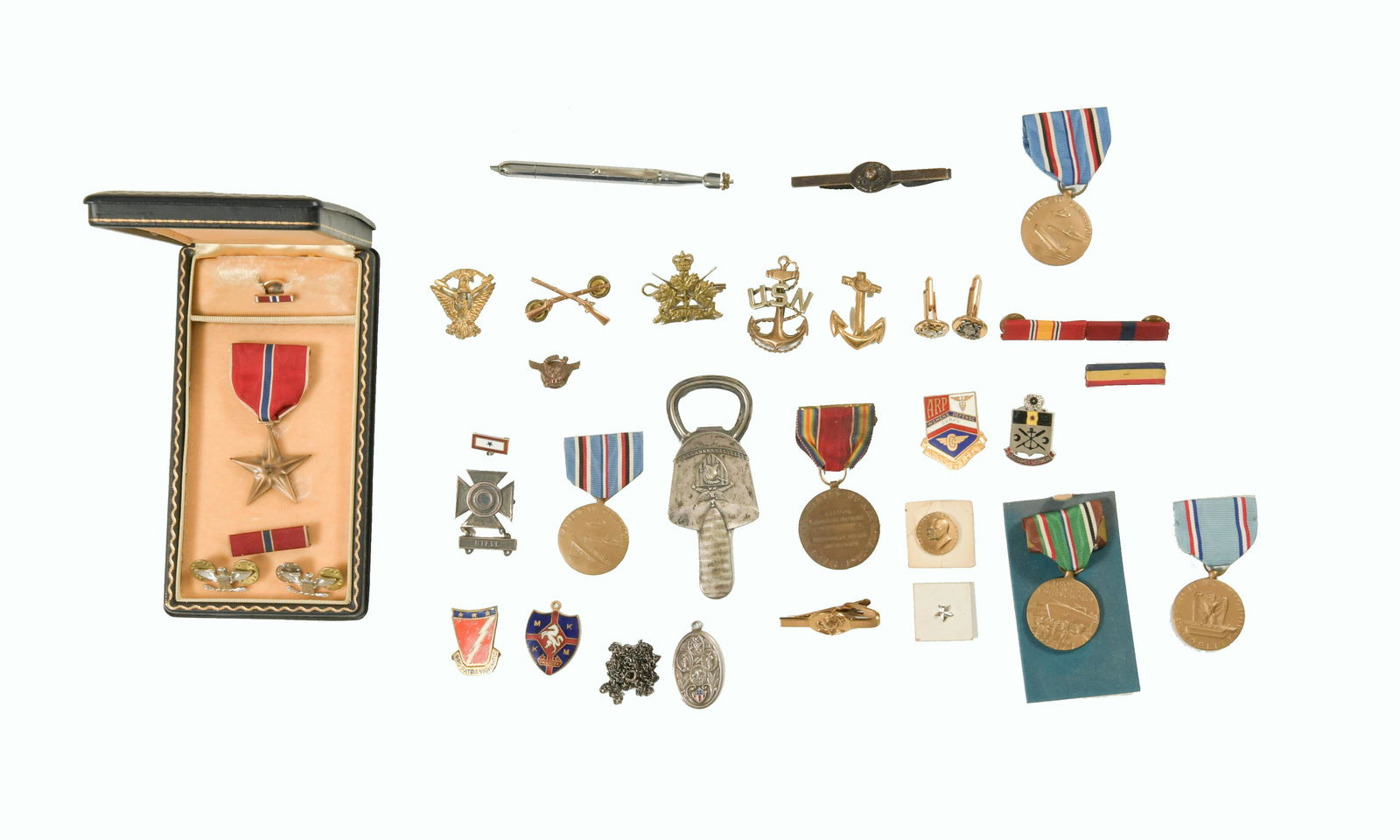 WWII Military Lot inc. Bronze Star and More: Cased Bronze Star, boxed EAME, American campaign medals, boxed in good conduct medal, loose American campaign medal and a loose WWII victory medal. Three US and Canada badges. Enamel Womens Defense Co
