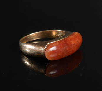 14K Gold and Red Jadeite Saddle Ring: 14K yellow gold ring with red jadeite. Dimensions are: Weight, 5.3 grams (.17 ozt.). Size 10. All measurements are approximate. Condition: Minor use wear. Provenance: From a private PA collection.