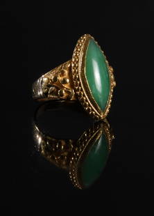 Chinese 22K Gold and Jadeite Ring: A 22K gold and jadeite ring from China. There is a Chinese character signature inside the crown. Total Weight: 6.8 grams (.22 ozt). Ring Size: 6 1/2. All measurements are approximate. Condition: