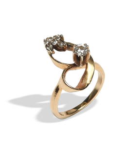 14K Gold .33 CTW Diamond Ring: 14K yellow gold ring with a .20 carat stone with a group of 6 smaller stones all totaling approximately .33 ctw. Dimensions are: Size 4 3/4. Weight: 3.8 grams (.12 ozt.) All measurements are