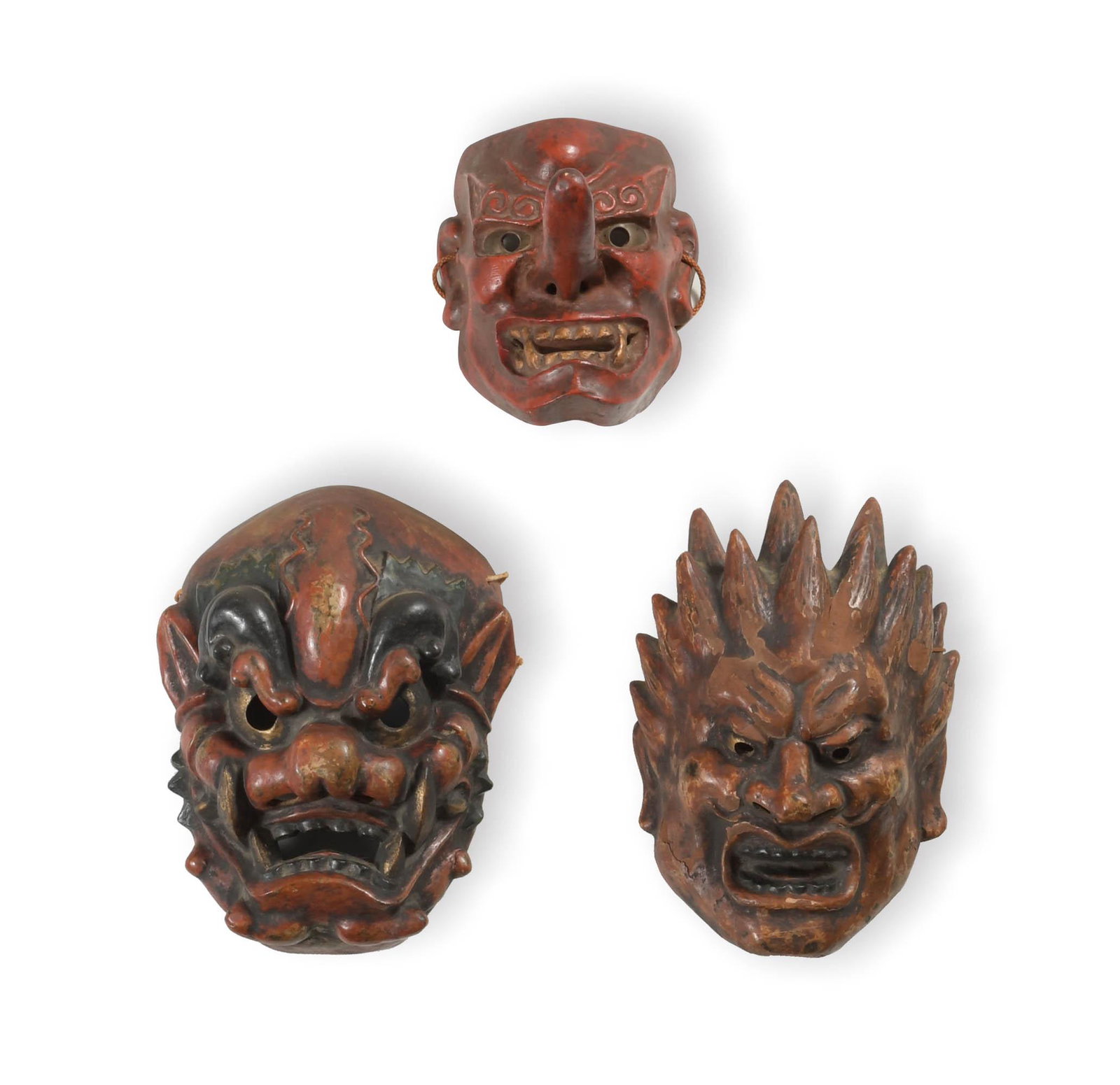 Group of 3 Japanese Noh Masks: A group of 3 Japanese Noh masks including one Tengu mask with two other masks possibly depicting demon characters. Noh is an ancient Japanese theatrical tradition ranging from performances of legendar