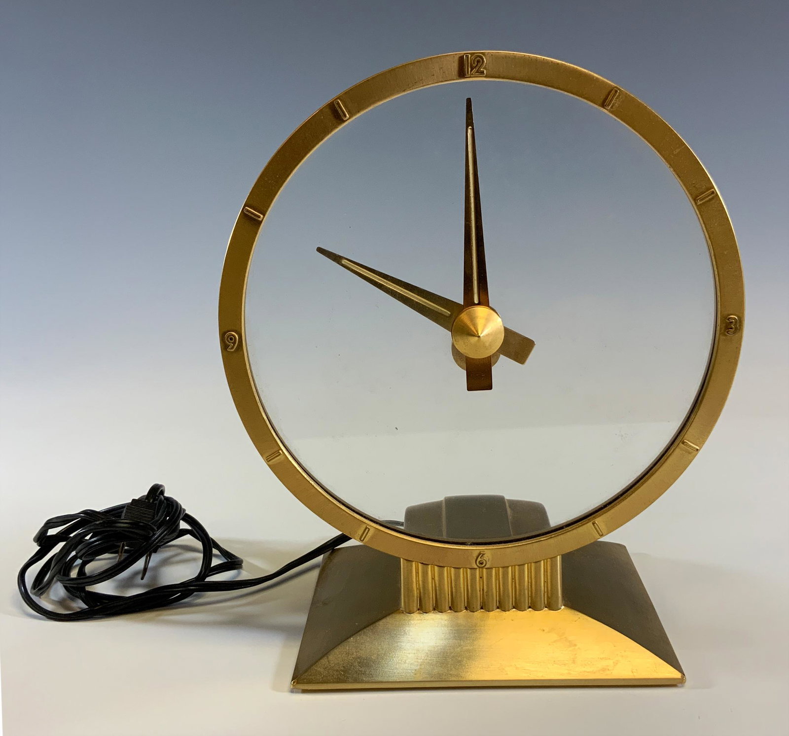 Jefferson Mid Century Golden Hour Mystery Clock: A Jefferson Mid-Century Modern golden hour mystery clock. Dimensions are: 10 inches tall X 6 inches wide, 4 1/2 inches deep. All measurements are approximate. Condition: Does not run. Provenance: From